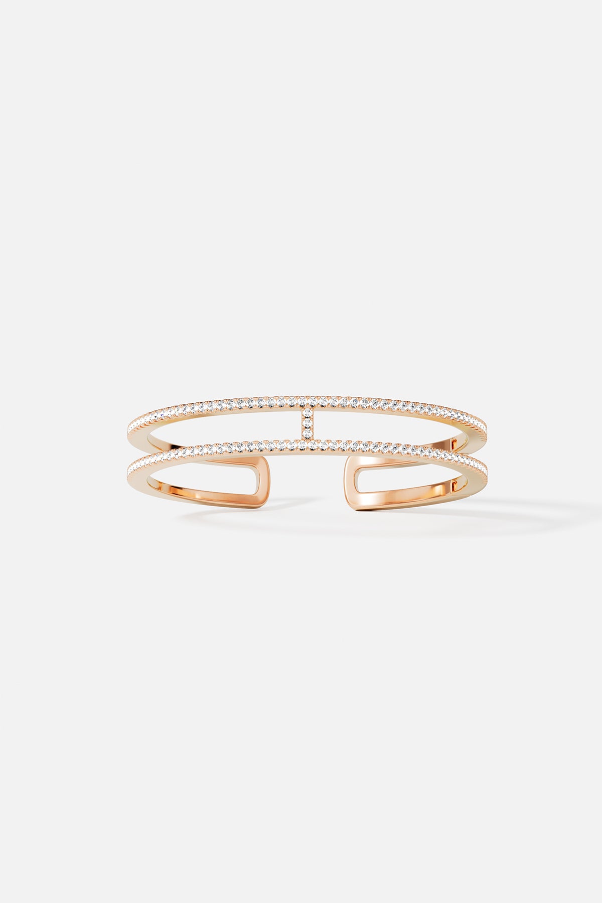 APM open cuff bracelet in warm rose color, sparkling with modern elegance.
