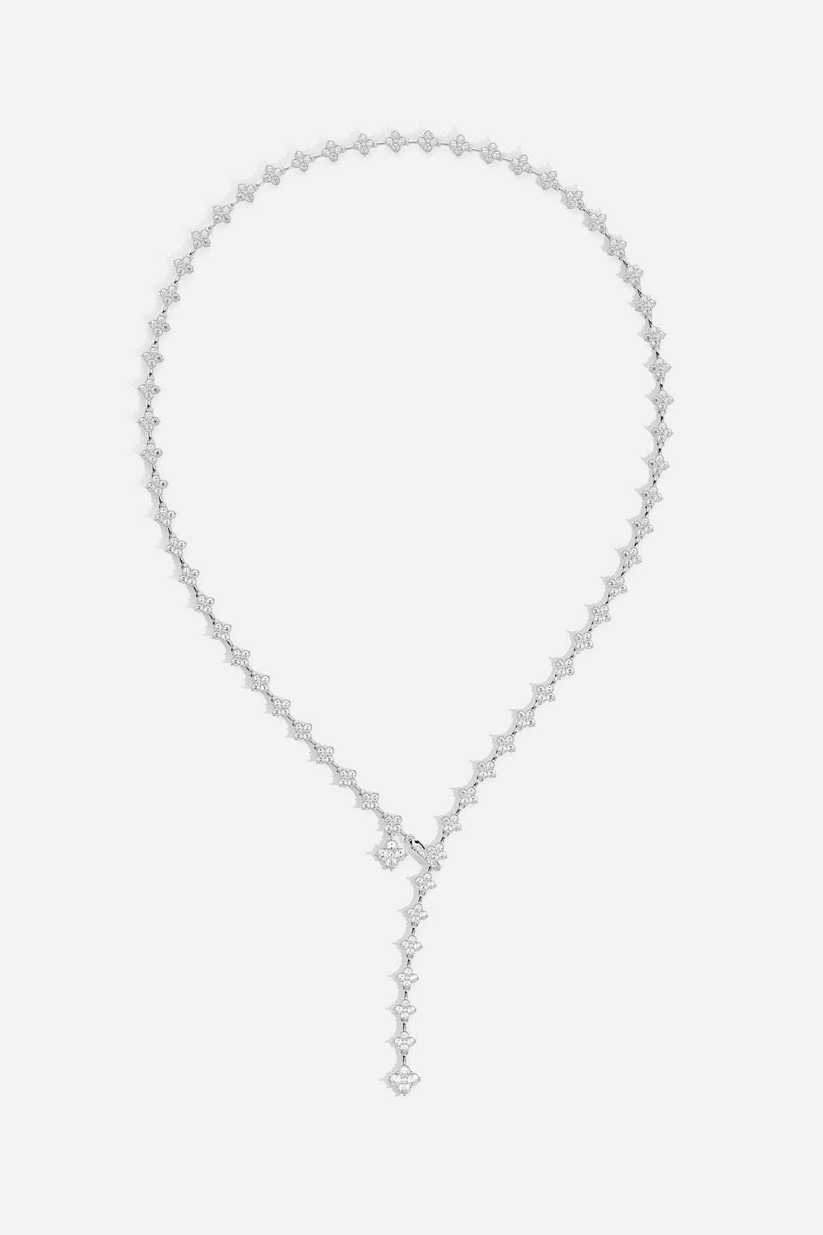 APM Necklace, a cascade of shimmering clovers in radiant rhodium finish.