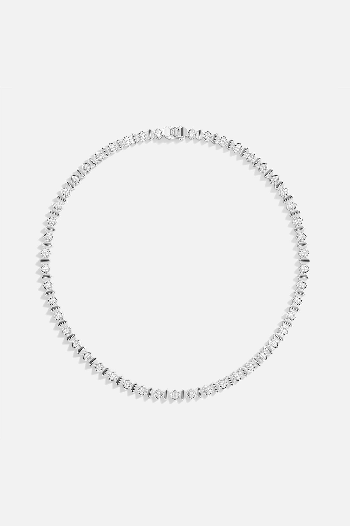 APM Monaco necklace, a luminous cascade of hexagons with rhodium finish brilliance.