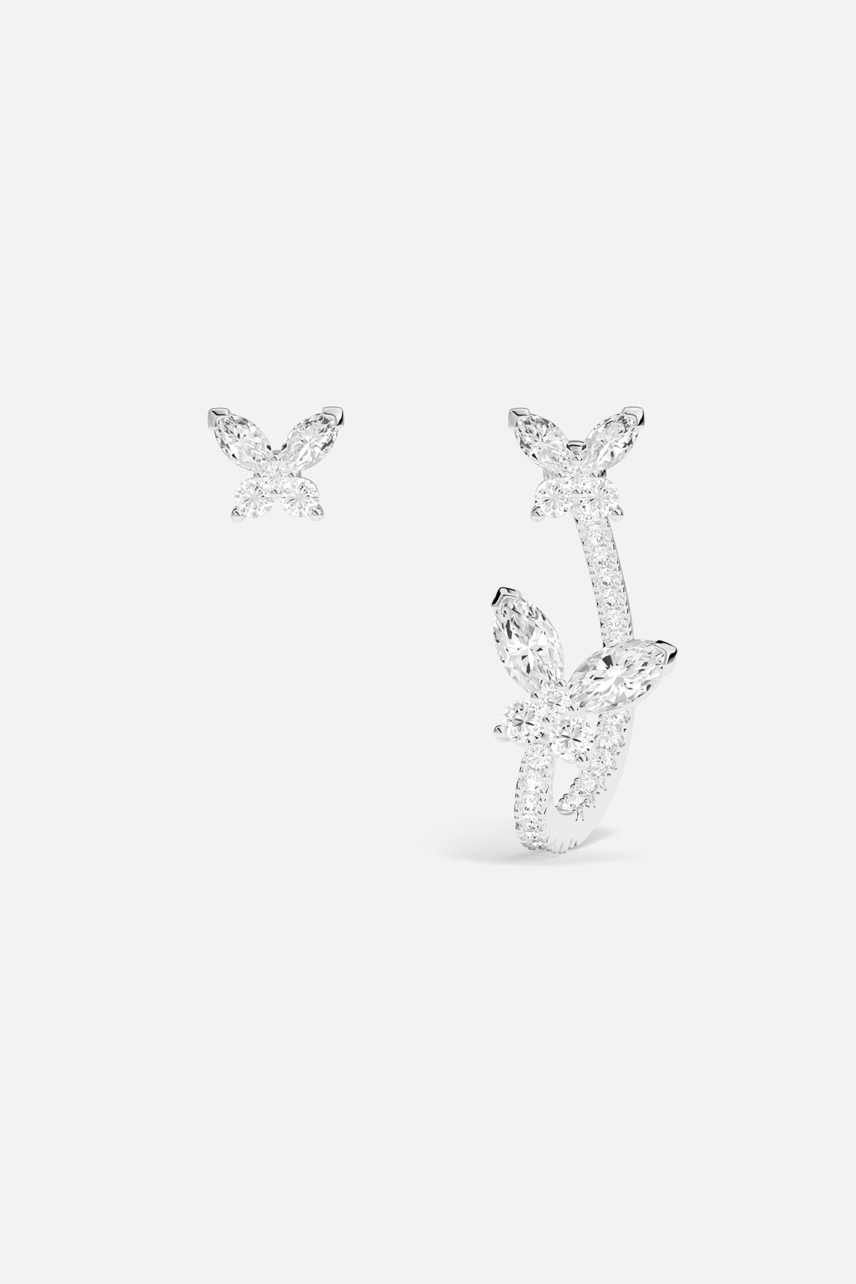 APM Butterfly Earrings, a delicate flutter of light and effortless charm.