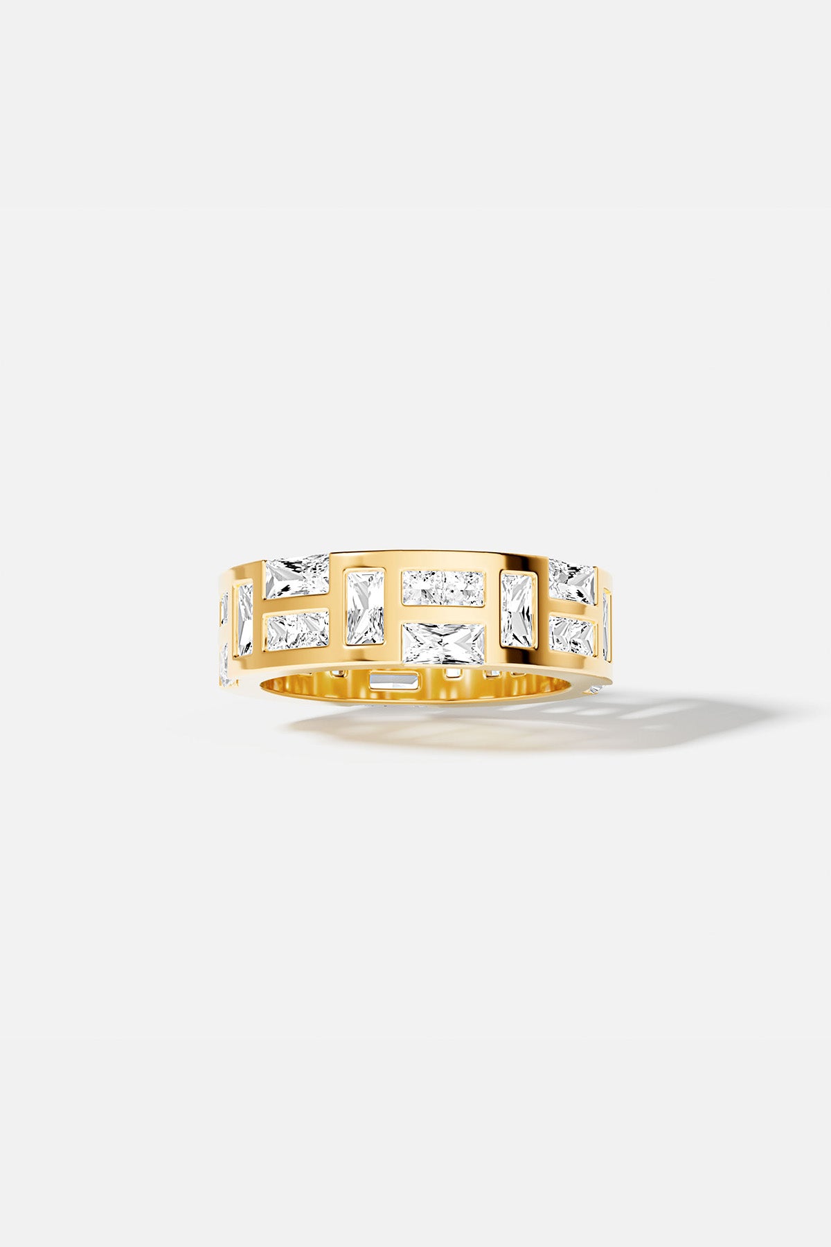 APM Ring in golden color, radiant architecture for a bold, modern statement.