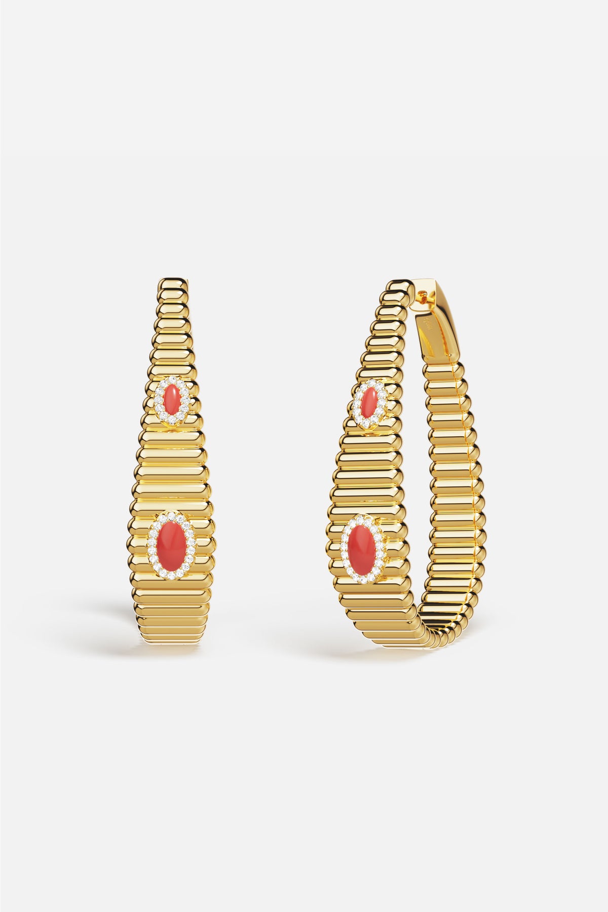 APM Hoop Earrings in golden ridges, coral accents glowing with quiet Riviera charm.