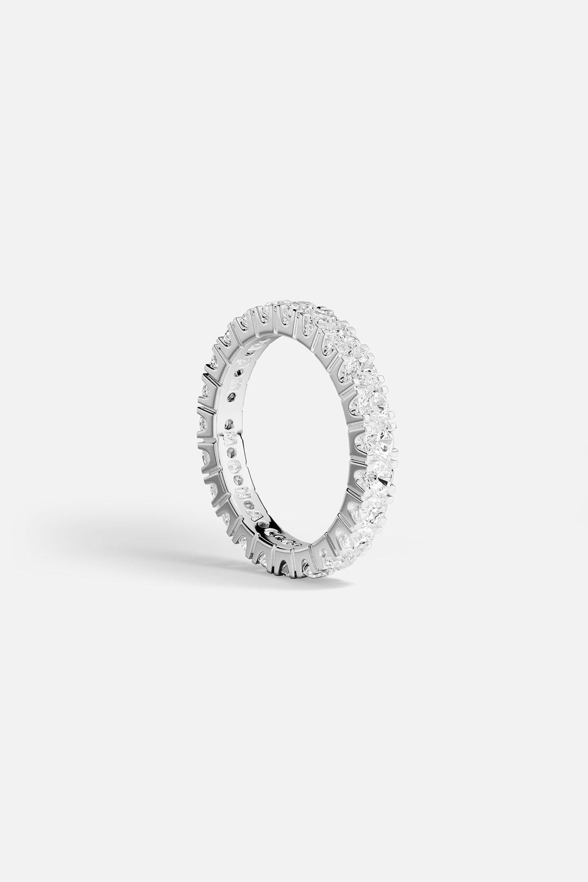 APM eternity ring in rhodium finish, a timeless sparkle for every day.