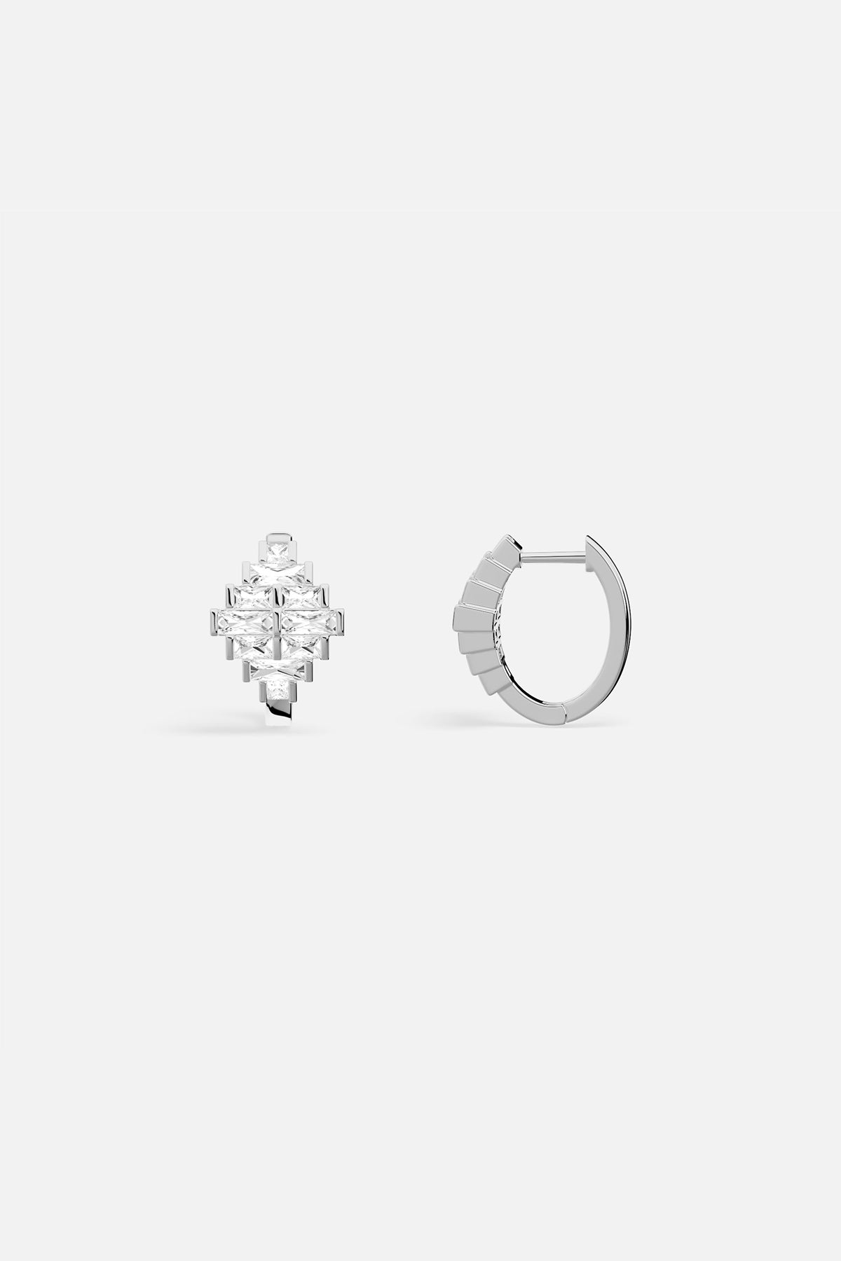APM Hoop Earrings in rhodium finish, a luminous geometric statement with quiet elegance.