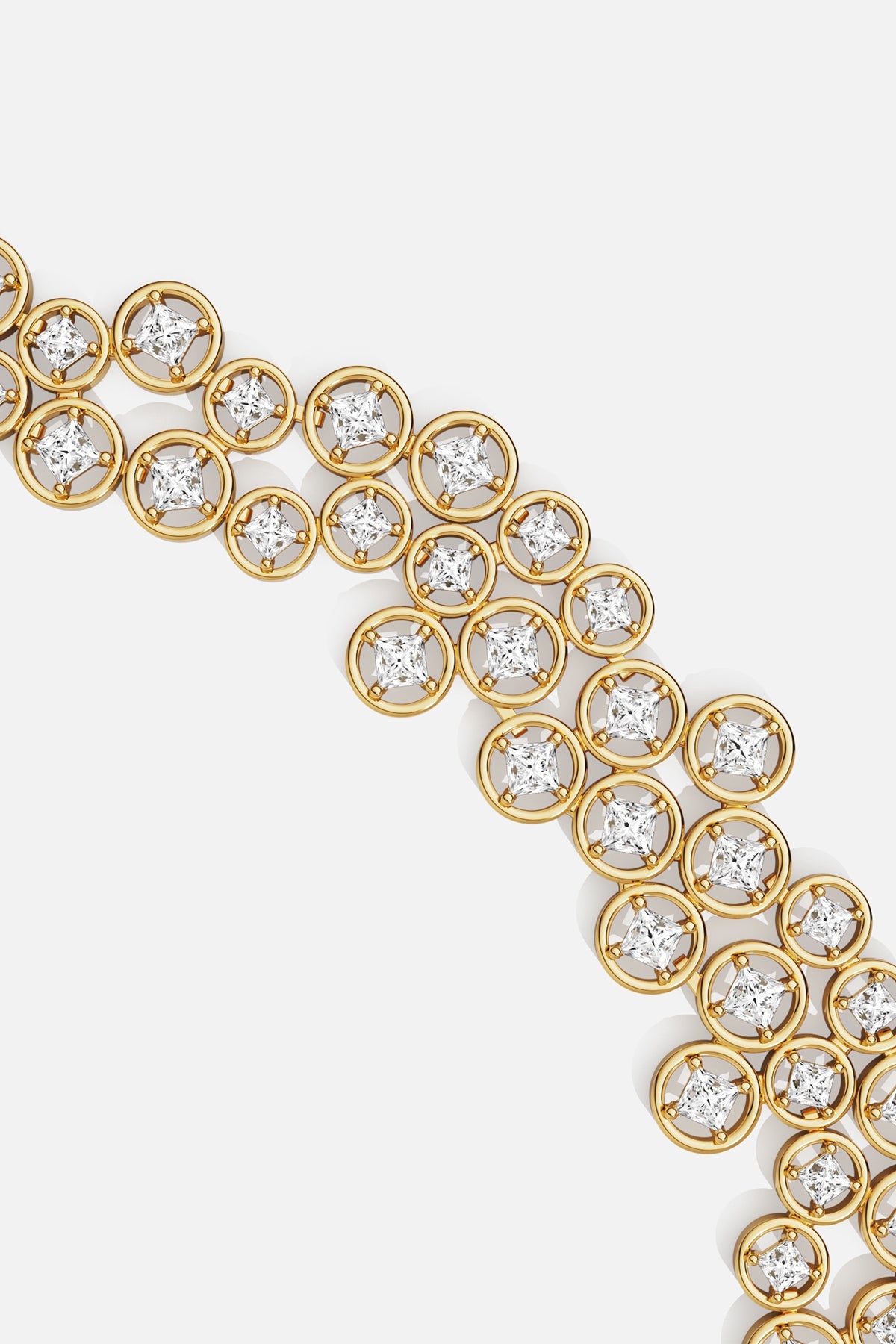 APM Monaco bracelet in gold color, a radiant cascade of circles and light.