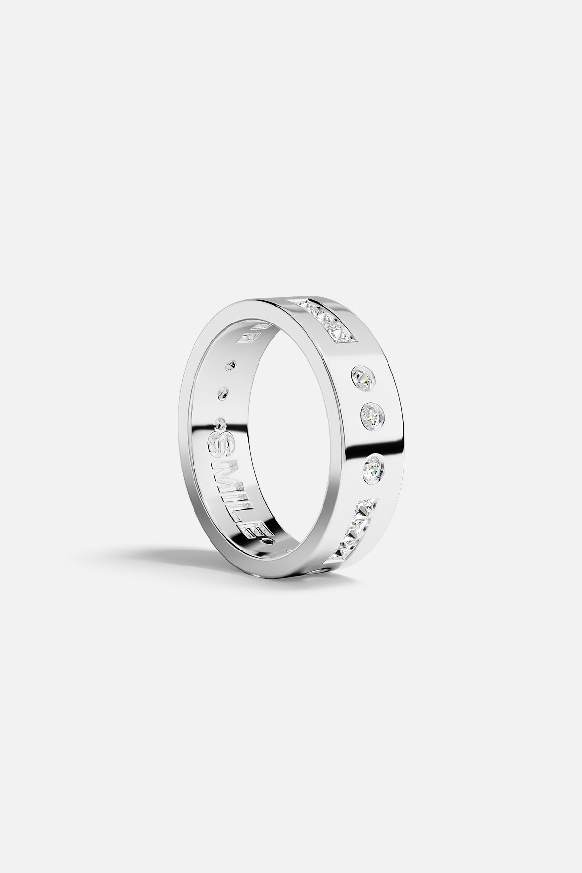 APM Monaco Morse Ring, a bold rhodium finish band whispering modern elegance.