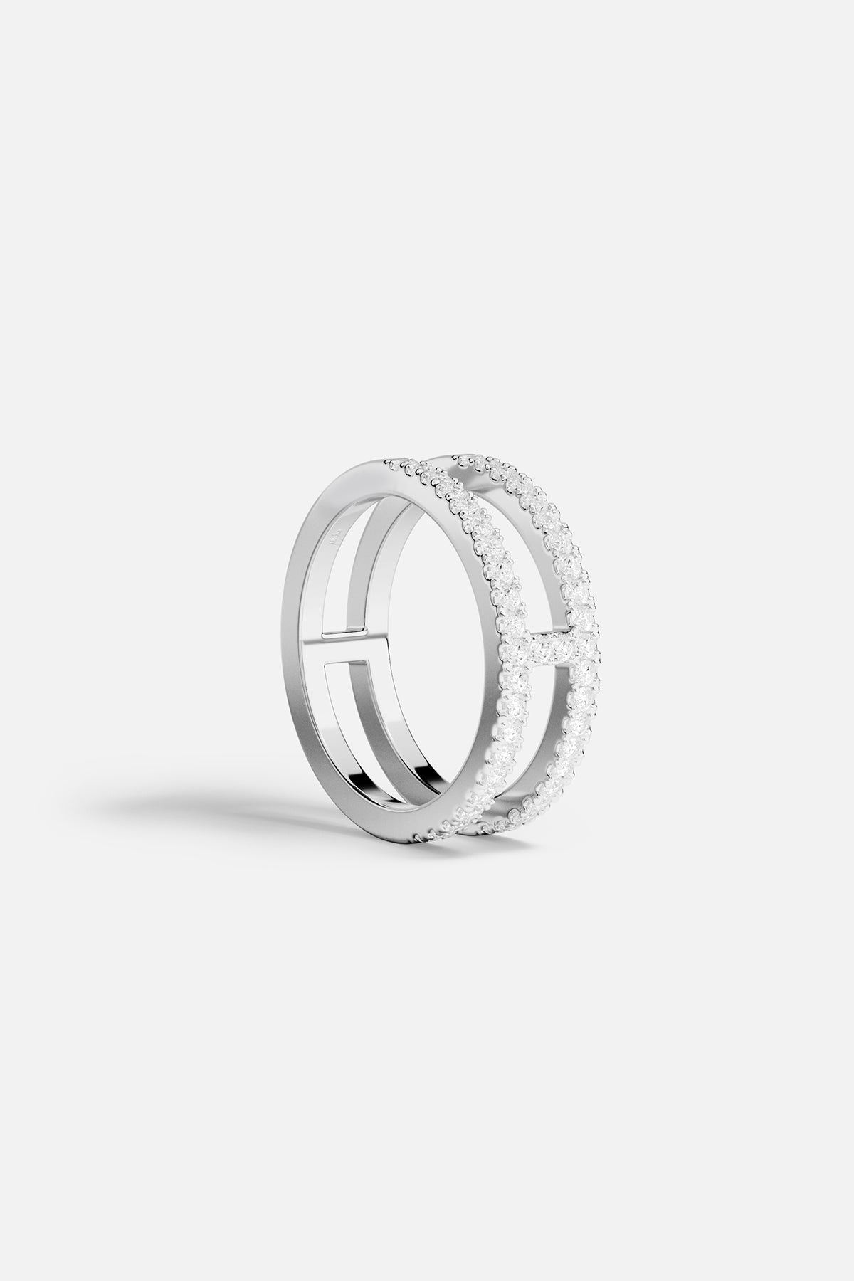 APM double band Ring in rhodium finish, a modern shimmer of effortless elegance.