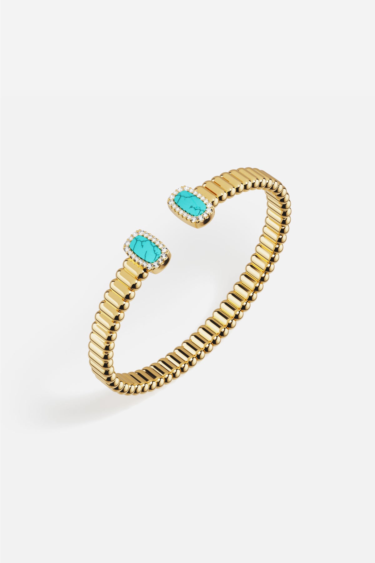APM Bangle in golden hues, turquoise accents whispering a breezy Riviera charm.