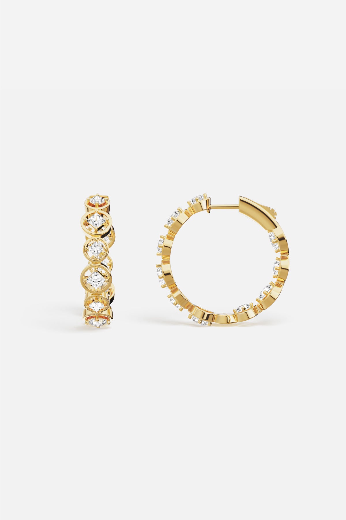 APM Hoop Earrings in golden color, radiant sparkle circling every moment with quiet elegance.