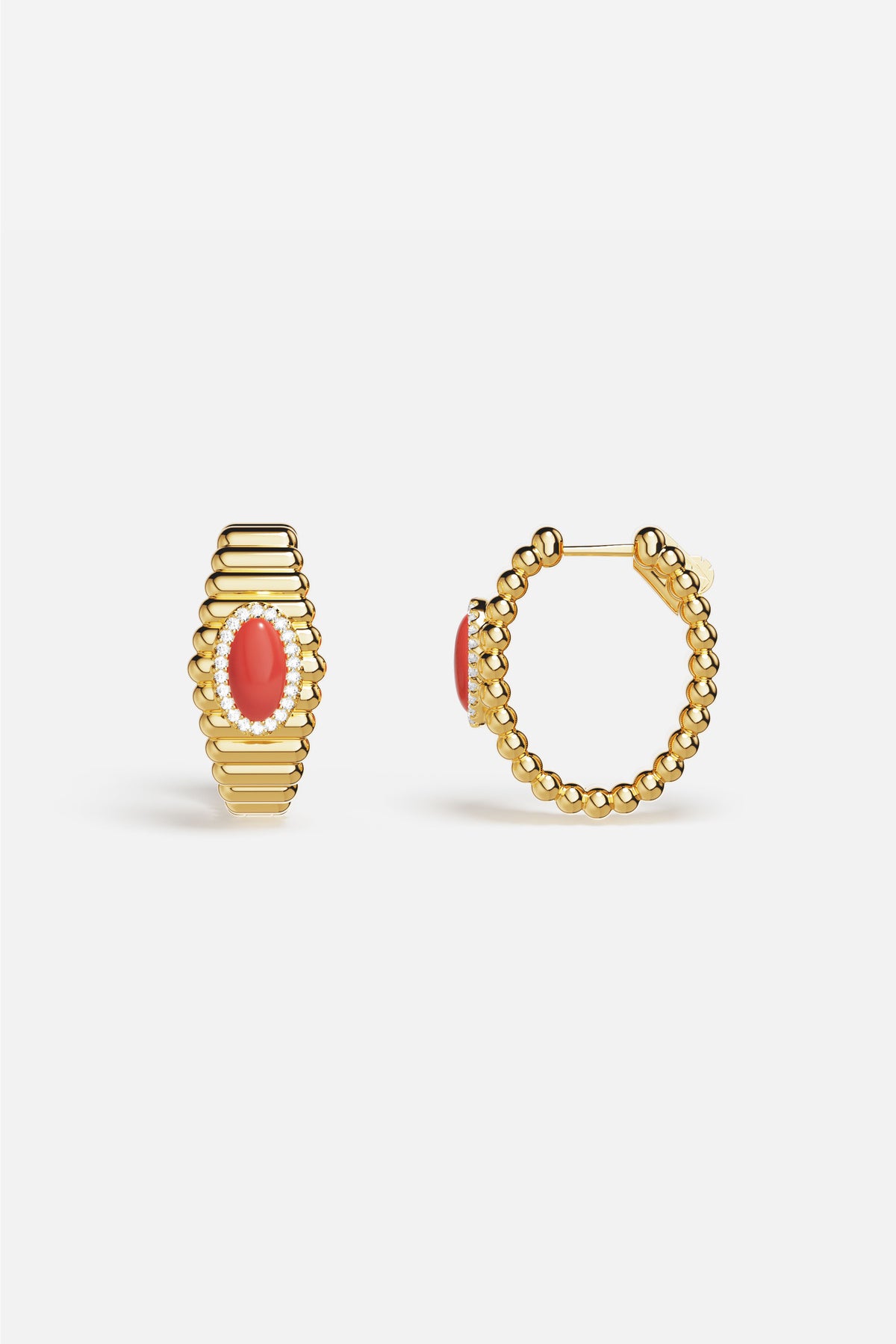 APM Hoop Earrings in golden warmth, glowing with a coral heart of quiet elegance.