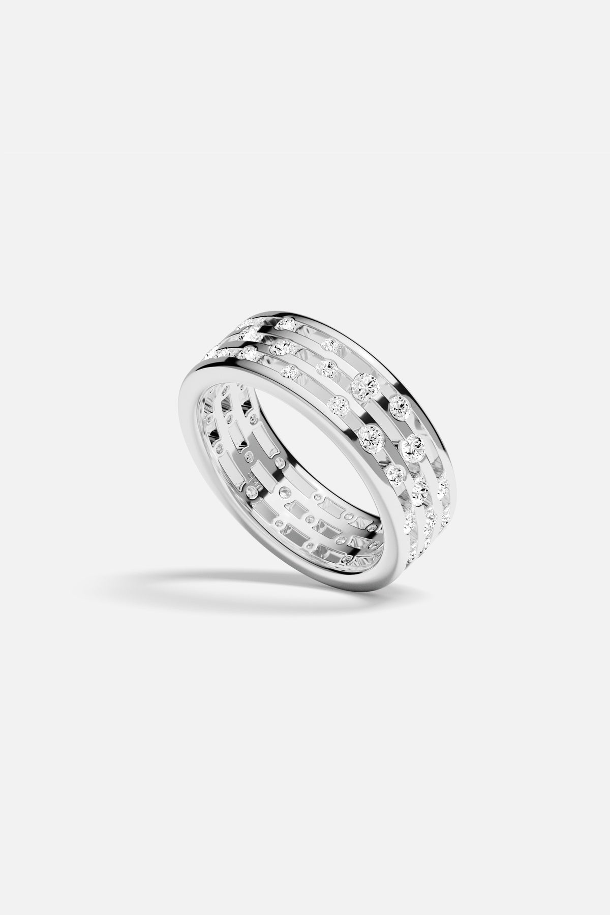 APM Ring in rhodium finish, a luminous statement of modern elegance.