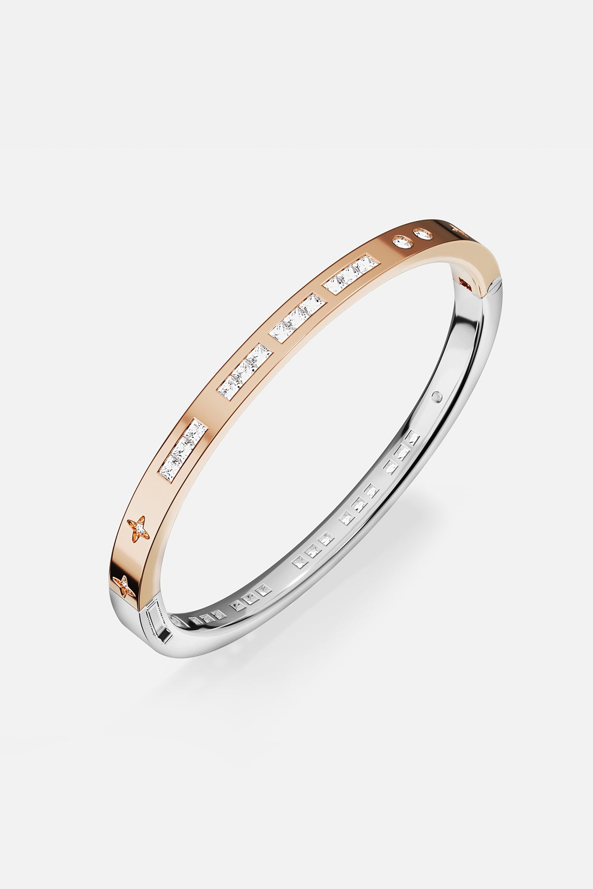 APM Monaco bangle in two-tone colors, a sleek statement of modern elegance.