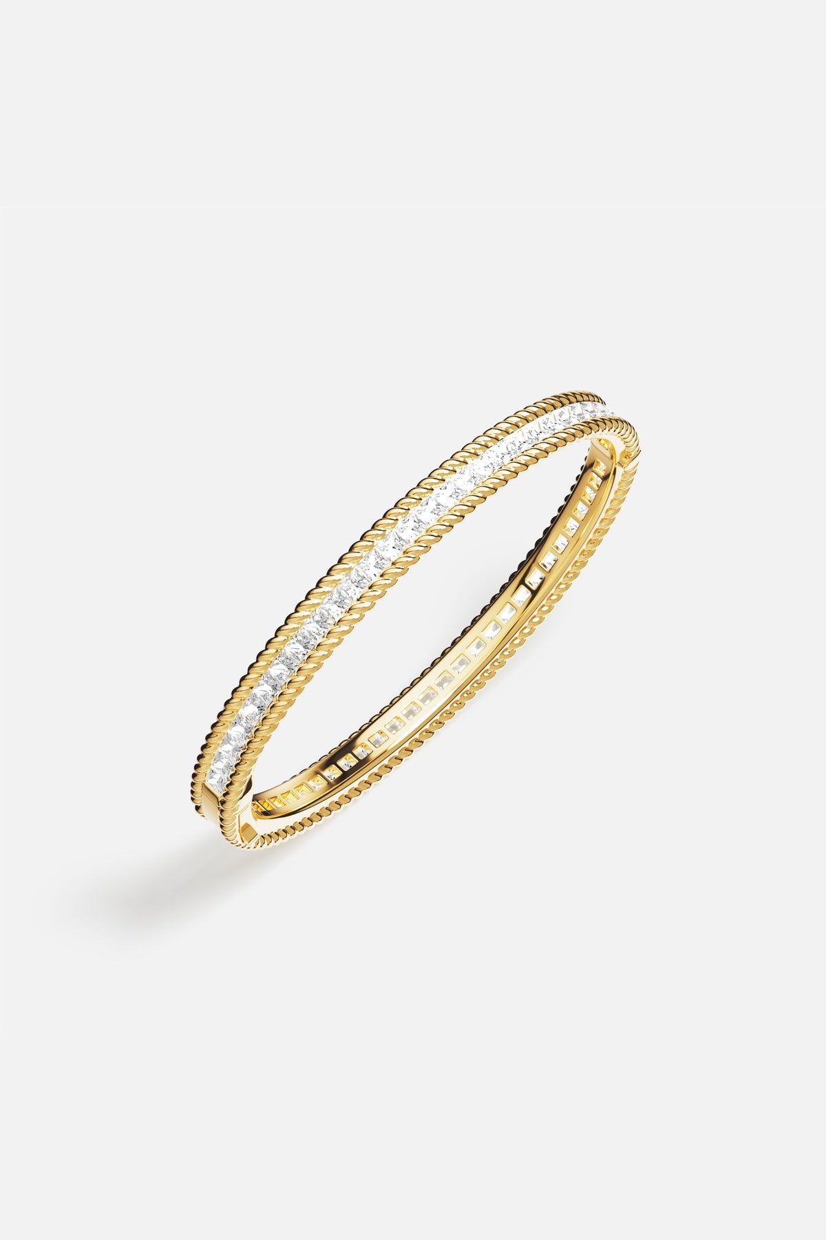 APM Bangle in golden color, a luminous line of quiet elegance.