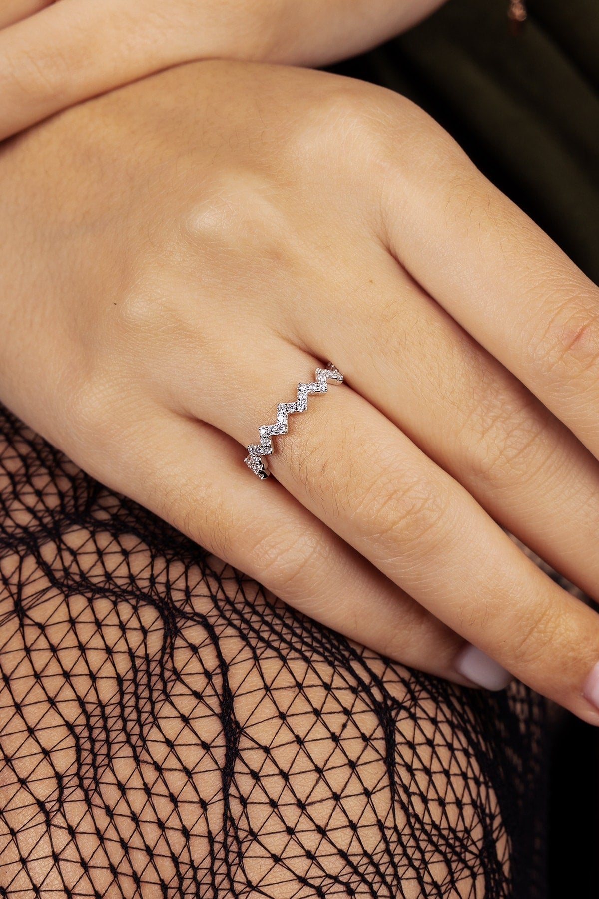 Close-up of a hand wearing a ring