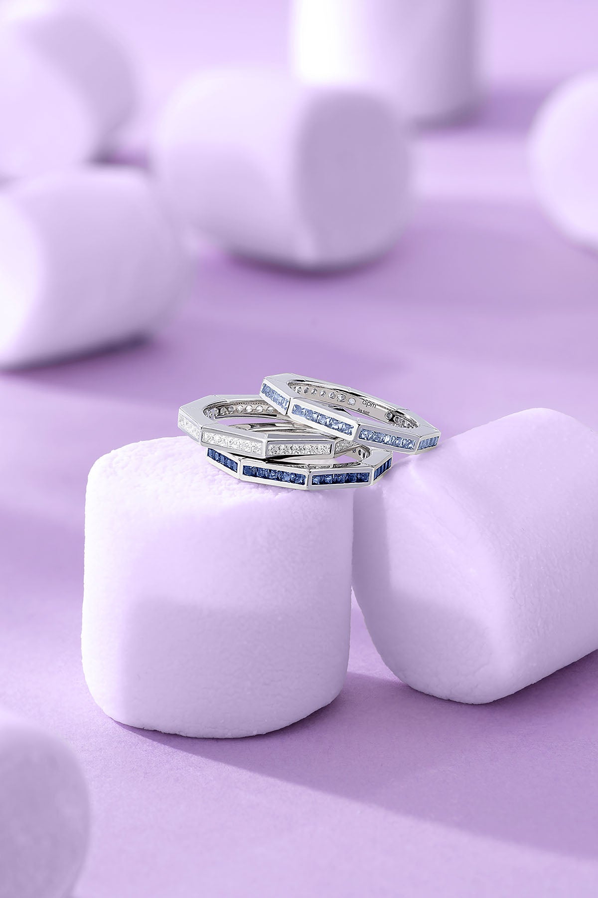 Geometric Pavé Ring on a purple background