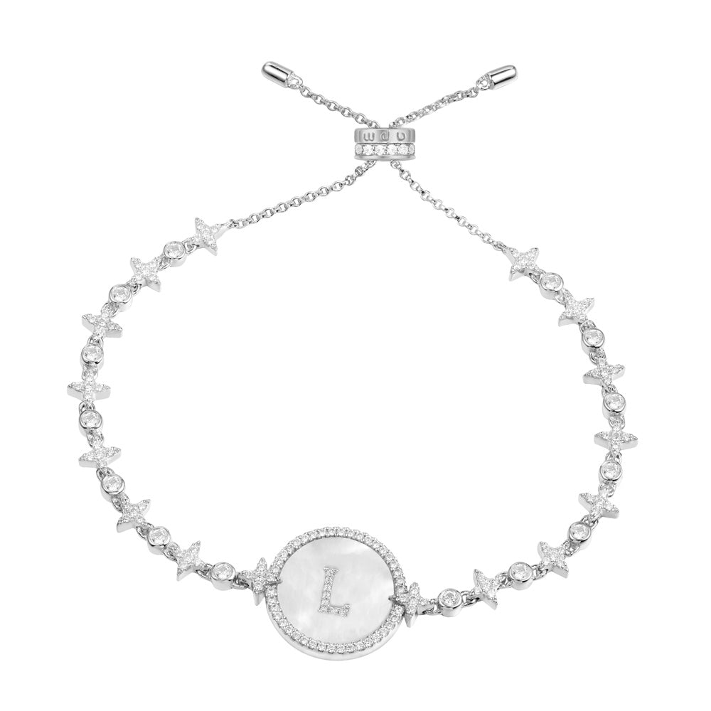 Bracelets APM Monaco silver tone bracelet with a delicate chain and letter L charm.