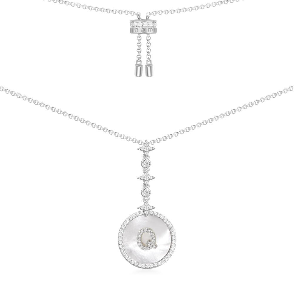Necklaces APM Monaco: silver chain with an ornate Q pendant.