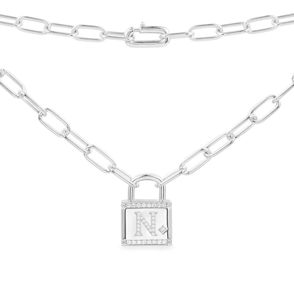 Necklaces APM Monaco: silver chain necklace with a silver padlock pendant bearing an N initial.