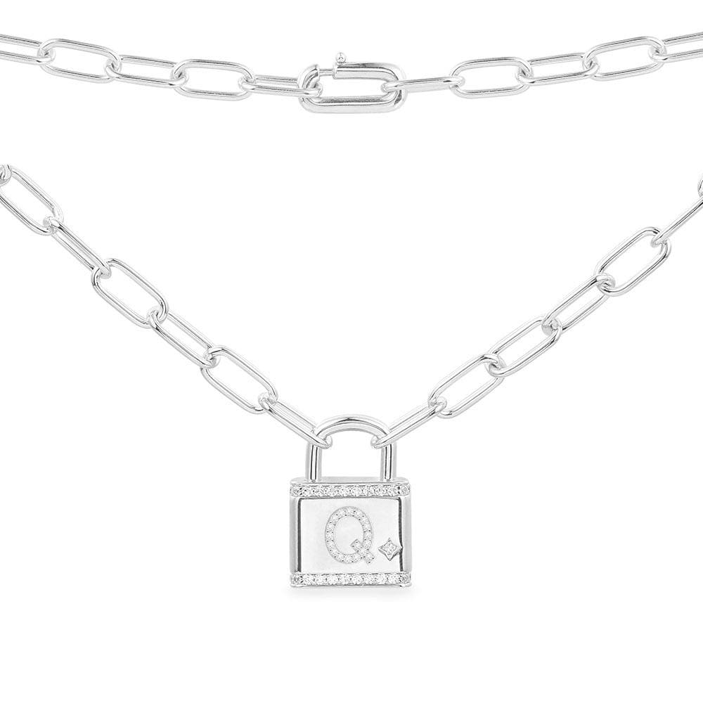 Necklaces APM Monaco, silver chain with a padlock pendant featuring a Q initial encrusted with tiny pavé stones.