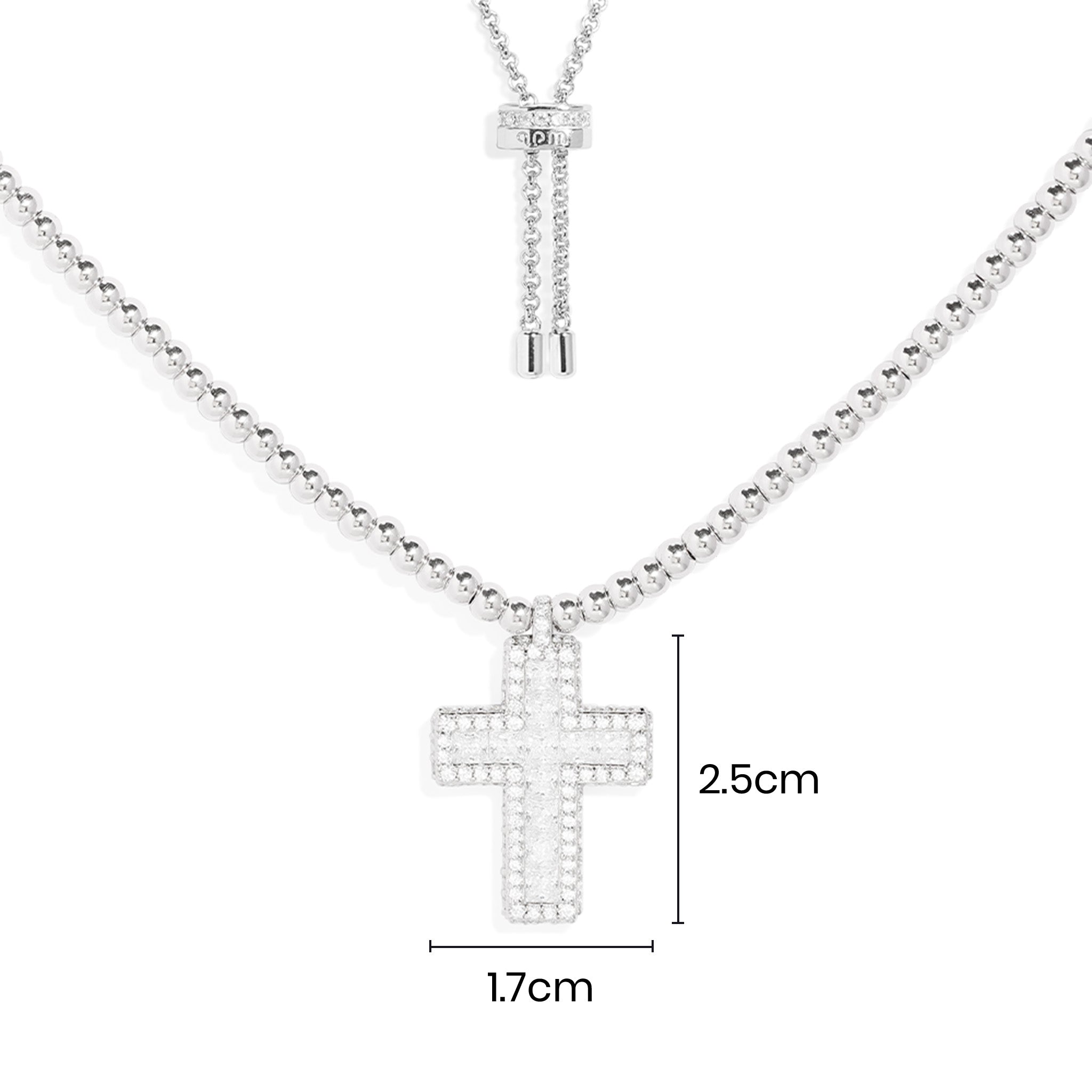 Necklaces APM Monaco, white tone chain with a cross charm and dimensions inscribed on the charm.