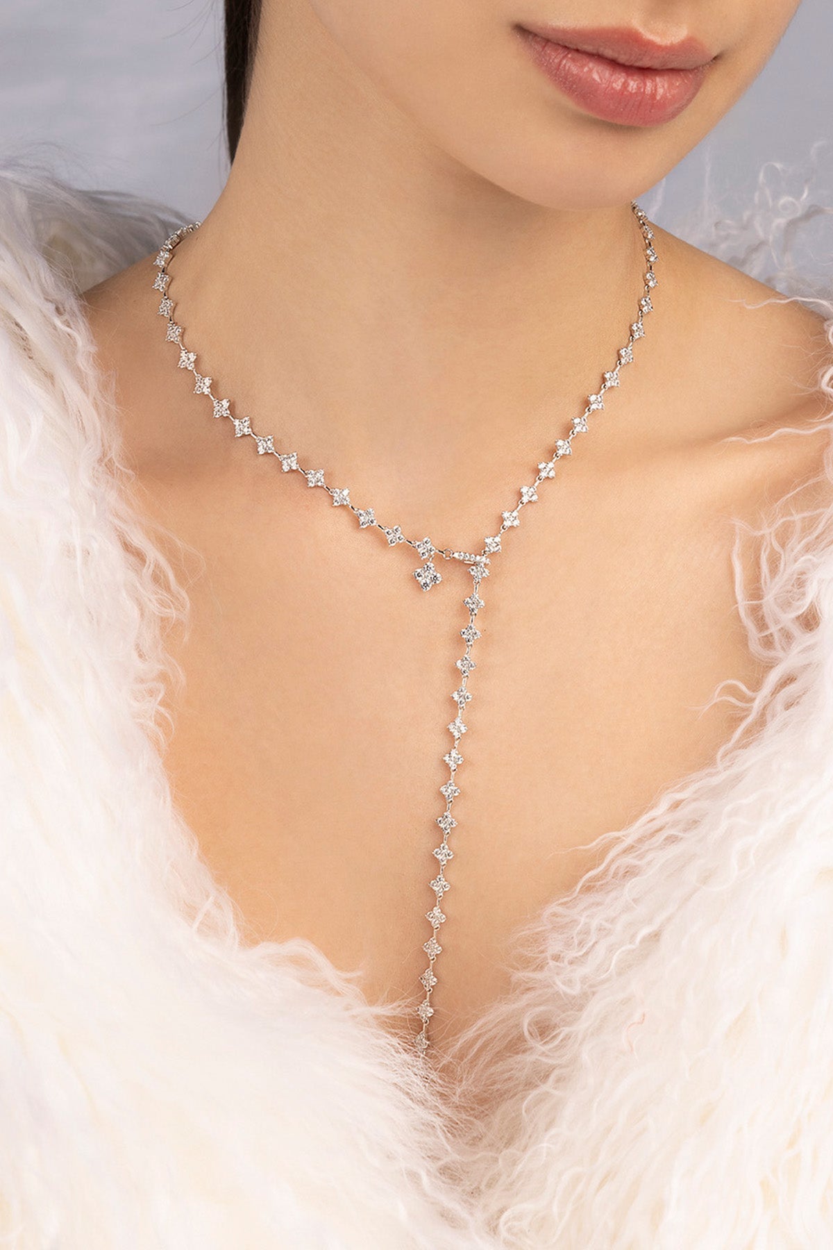 APM MONACO y drop spark adjustable necklace in silver worn on model