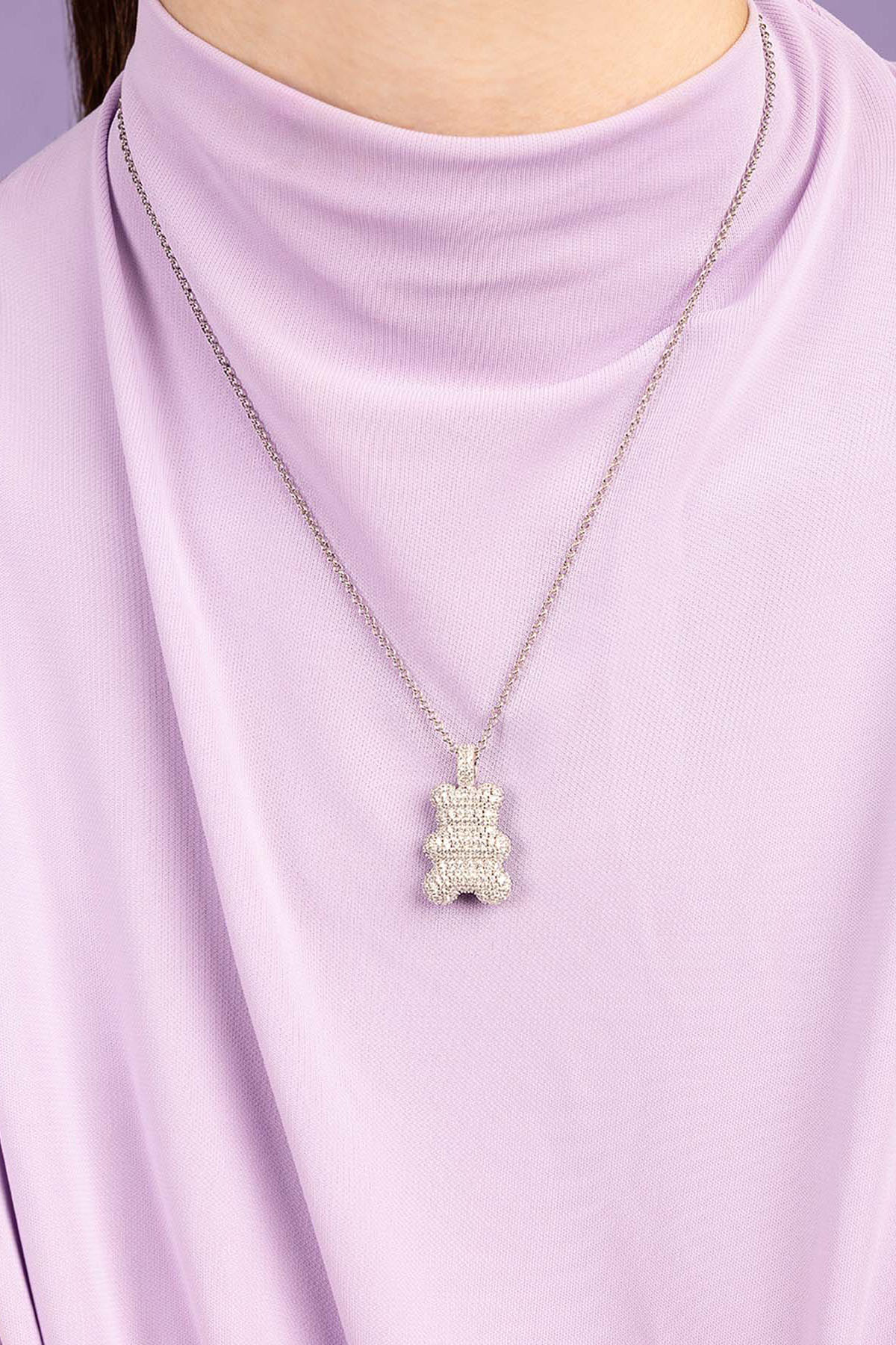 APM Monaco Baba Yummy Bear Adjustable Necklace worn on model with lilac background