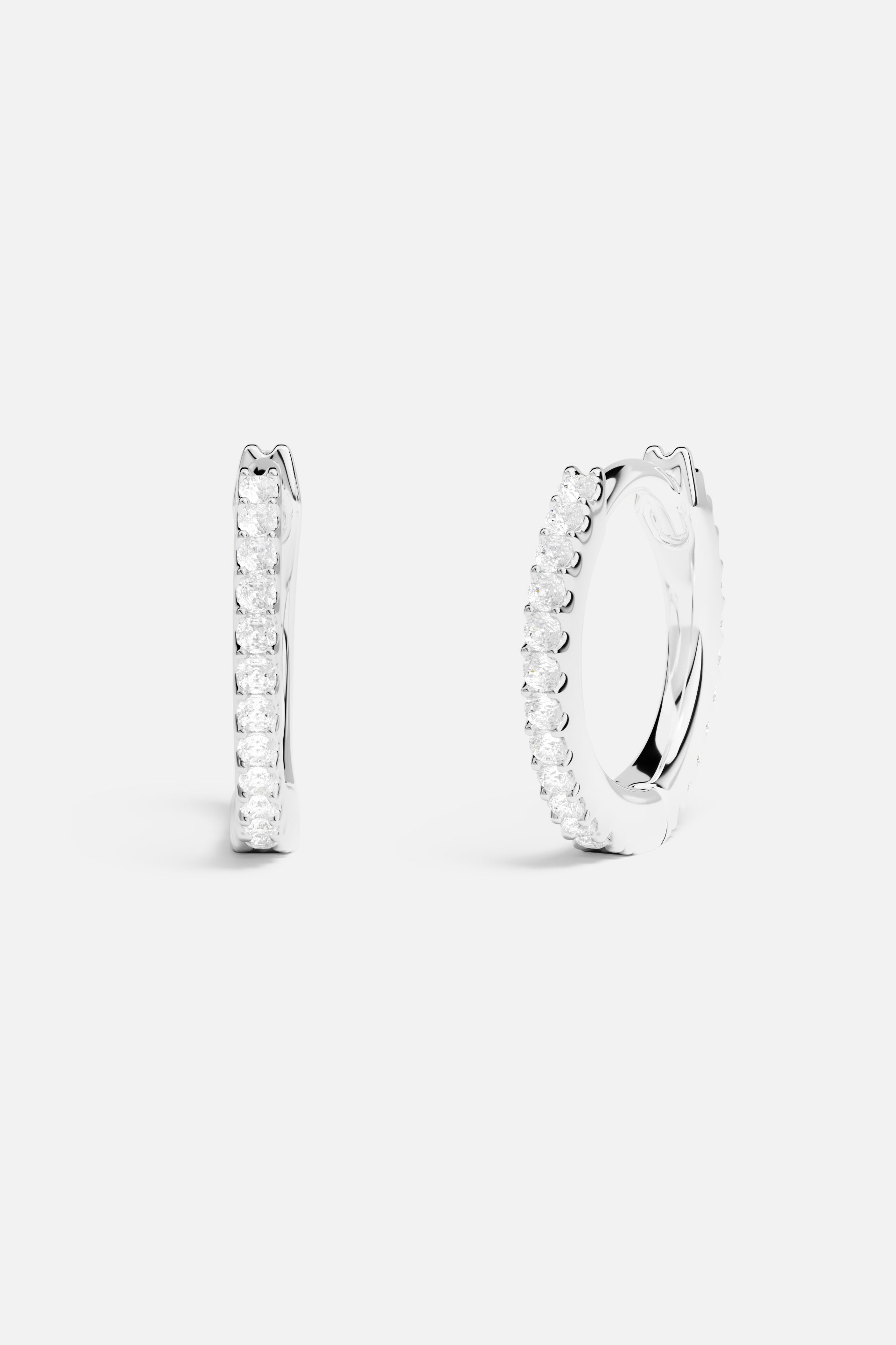 Earrings APM Monaco — pavé hoop earrings in white with diamonds, 8.5 mm diameter.