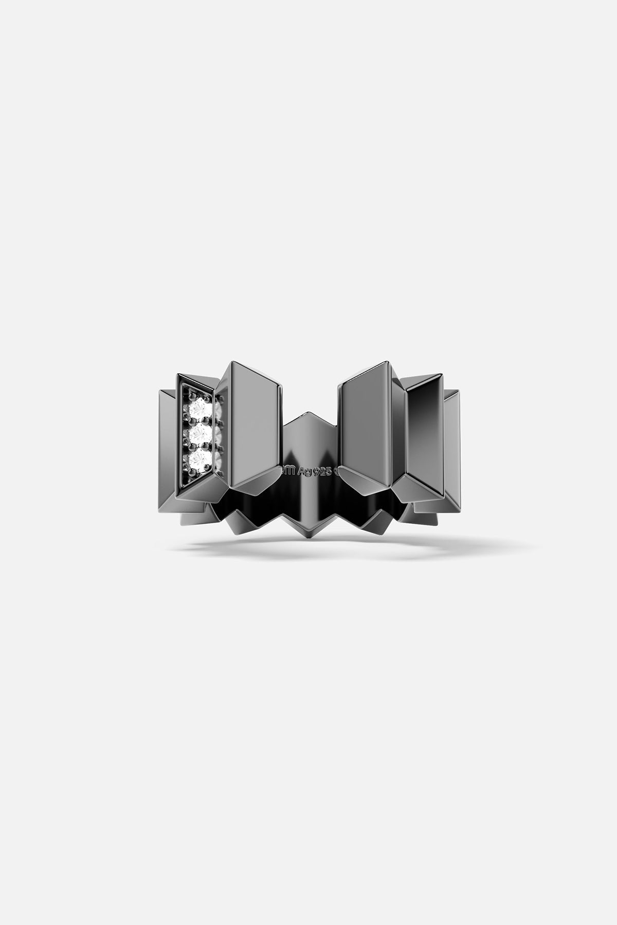 Single ear cuff with geometric design on a white background
