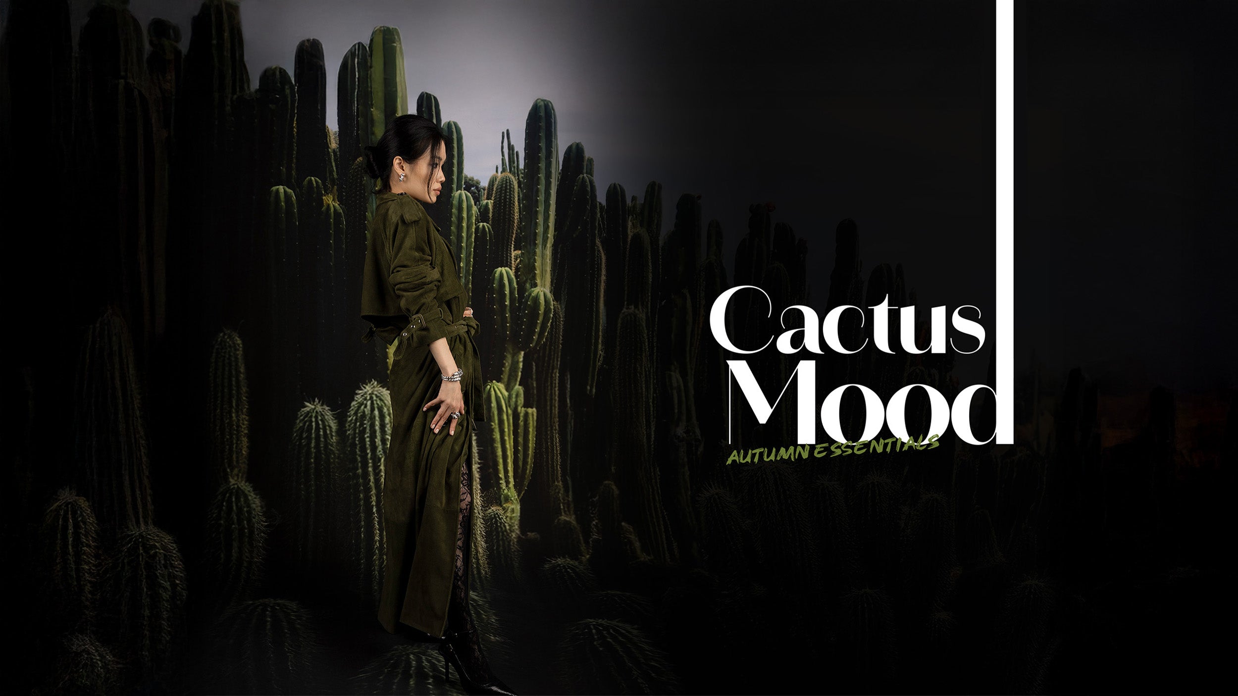 Woman in a dark outfit and KAA jewels standing among cacti with 'Cactus Mood' text on a dark background