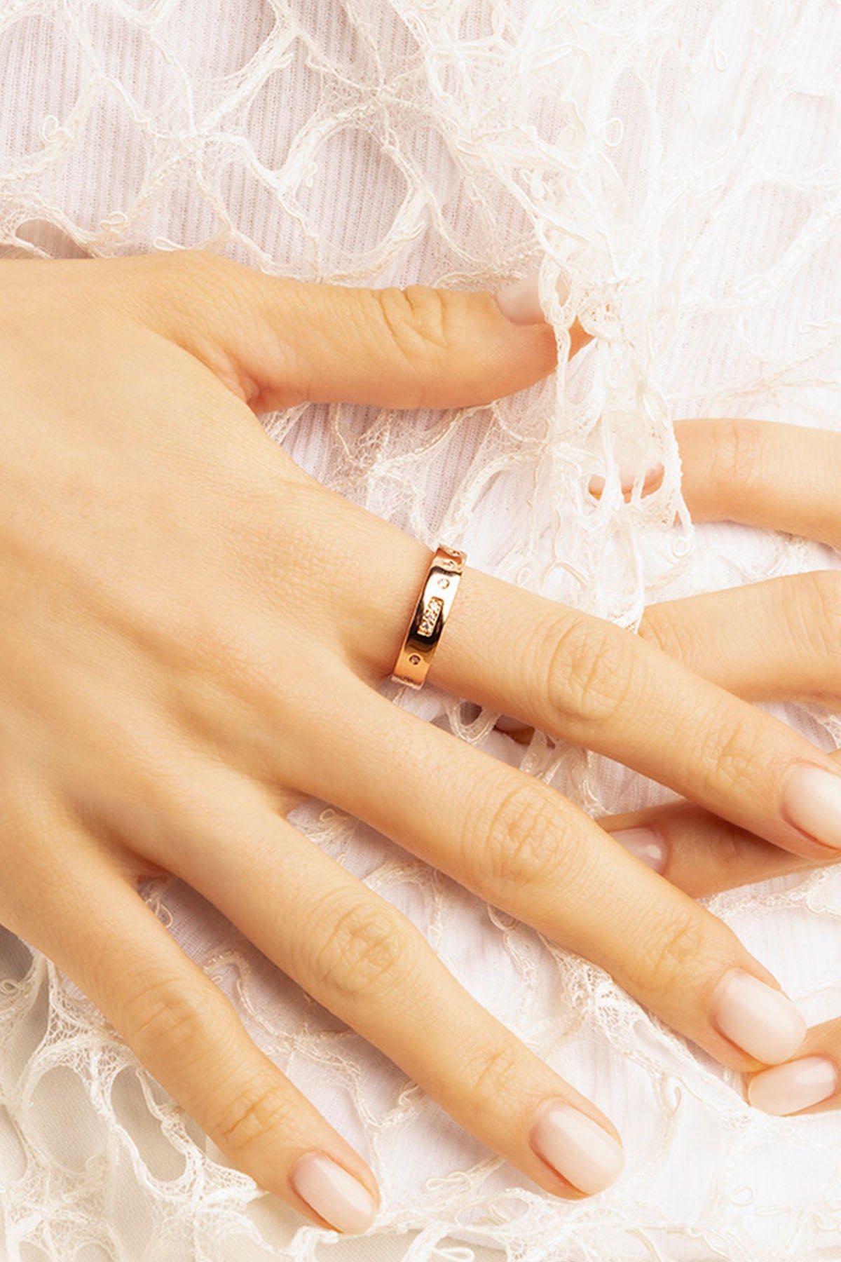 APM Monaco LOVE Morse Code Ring in rose gold worn on hand