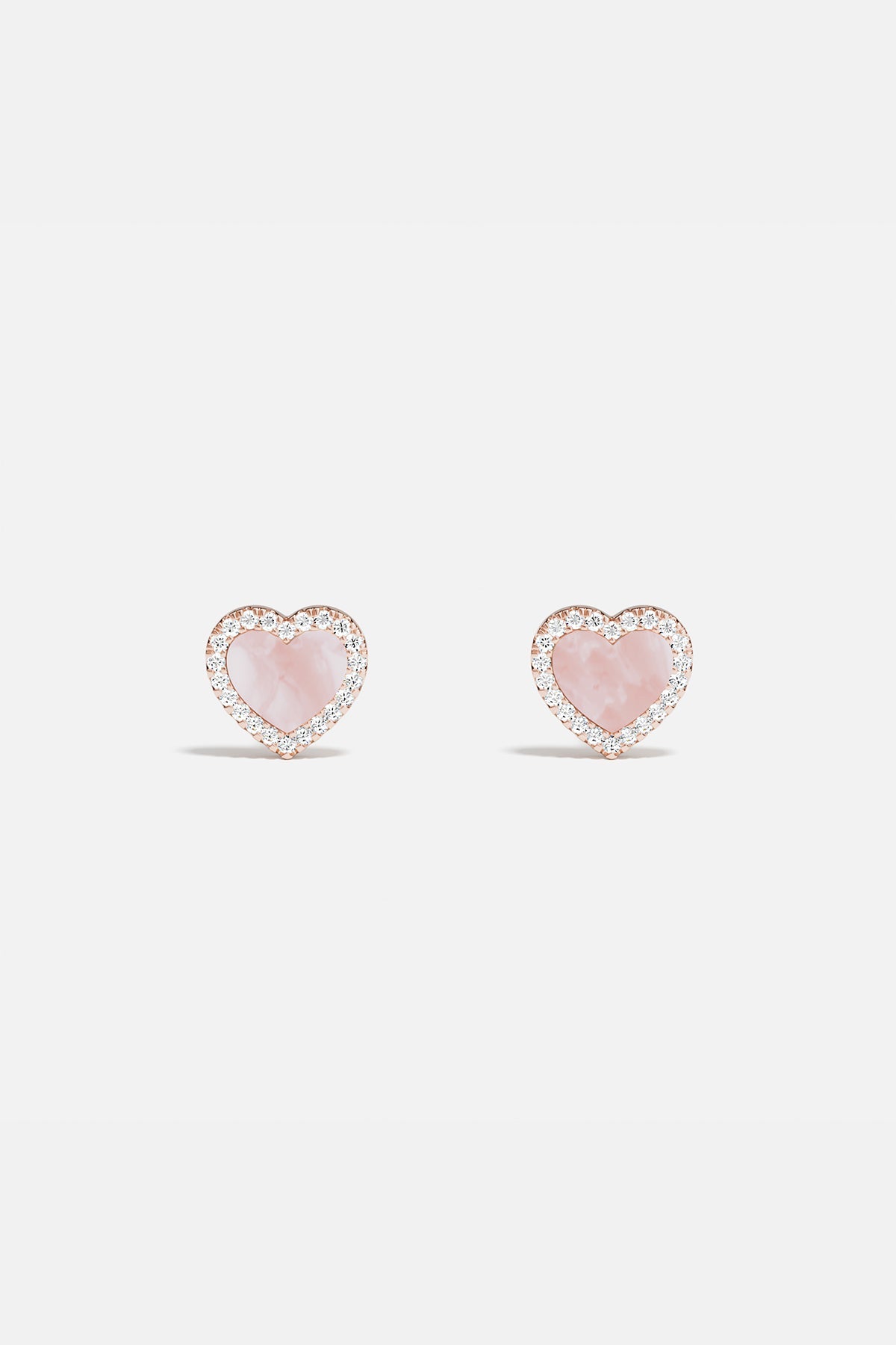 Earrings APM Monaco rose gold heart-stud with pink nacre.