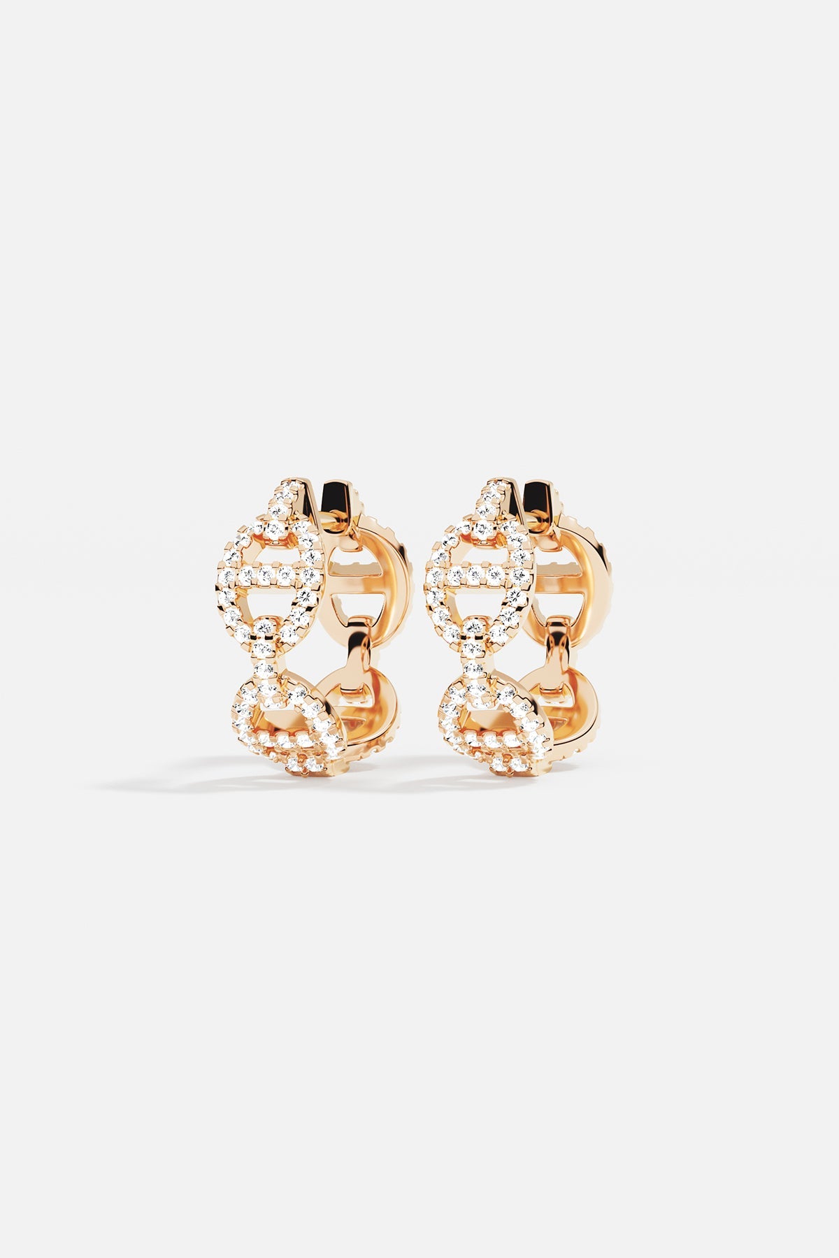 Earrings APM Monaco: yellow gold maille hoop earrings with pavé diamonds.