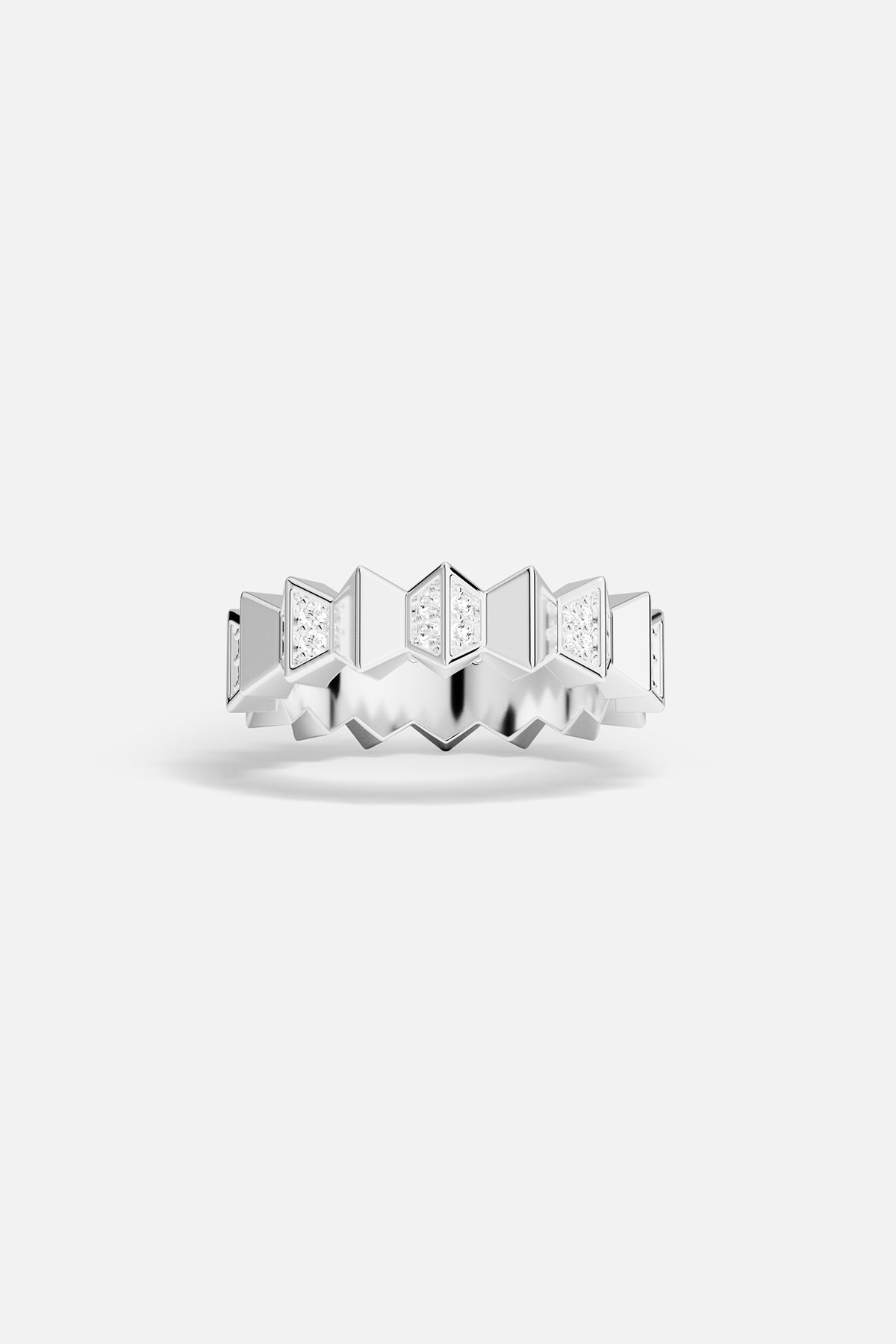 Silver-tone ring with geometric design on a white background