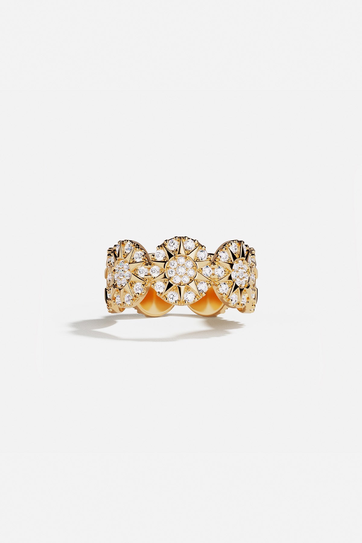 Ring, APM Monaco, yellow gold sunburst design with a starburst motif; statement style with no visible stones.