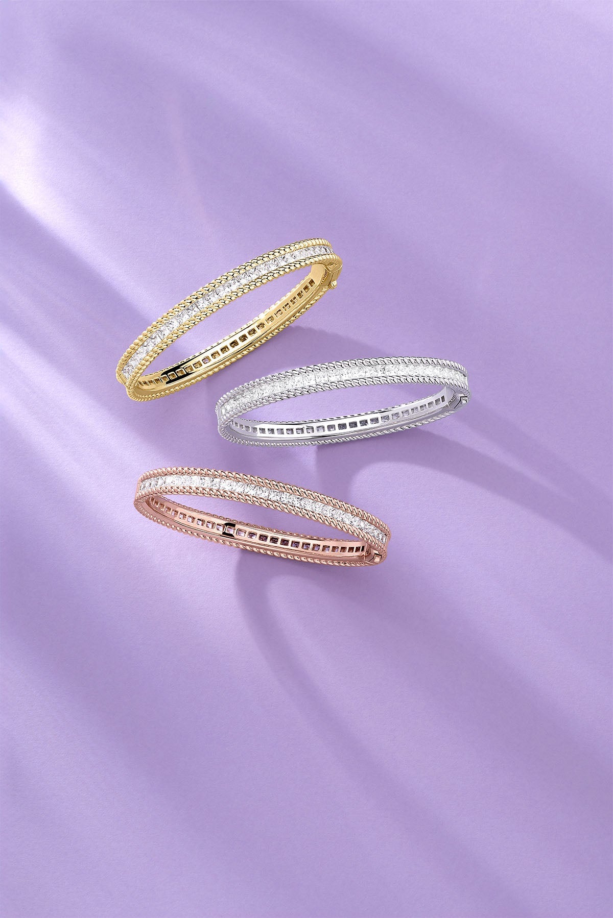 Torsade Pavé Bangle on a purple background