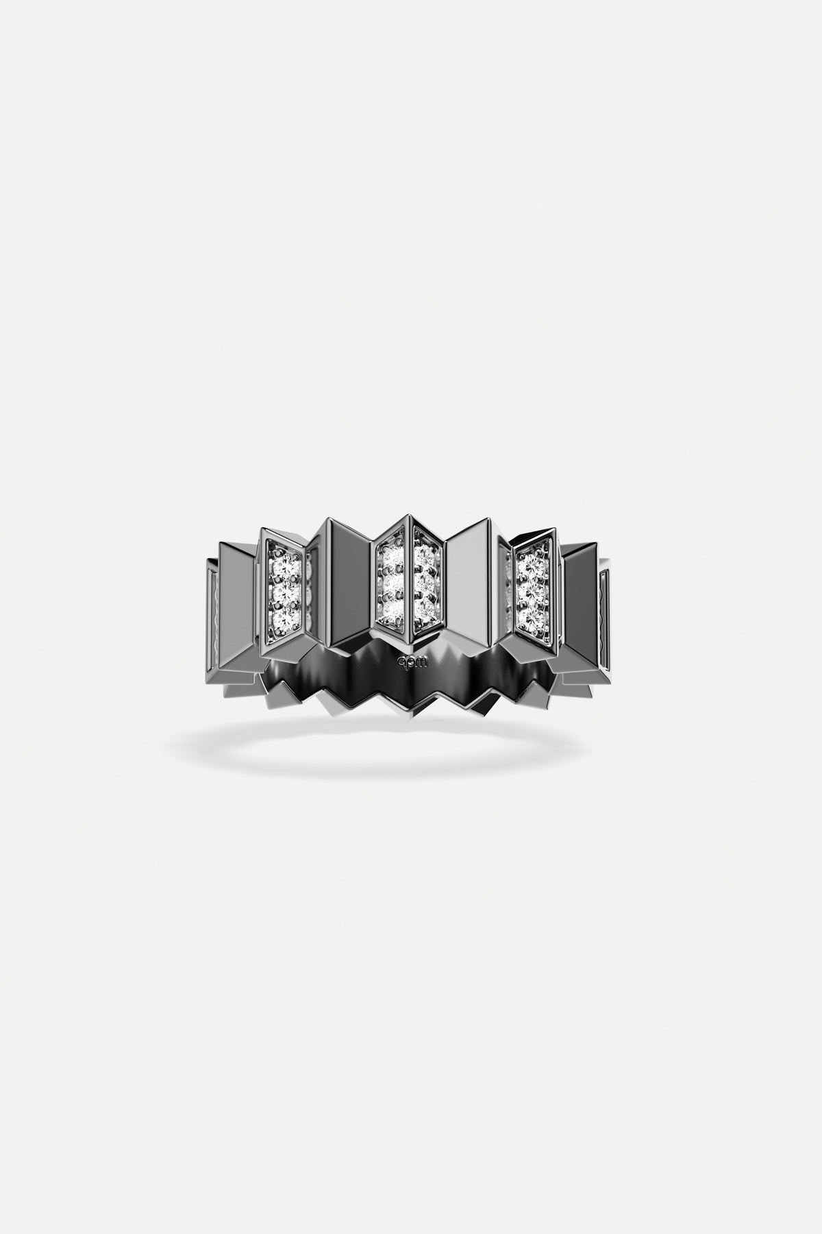 APM Ring, geometric edge in rhodium finish, sculptural and boldly modern.