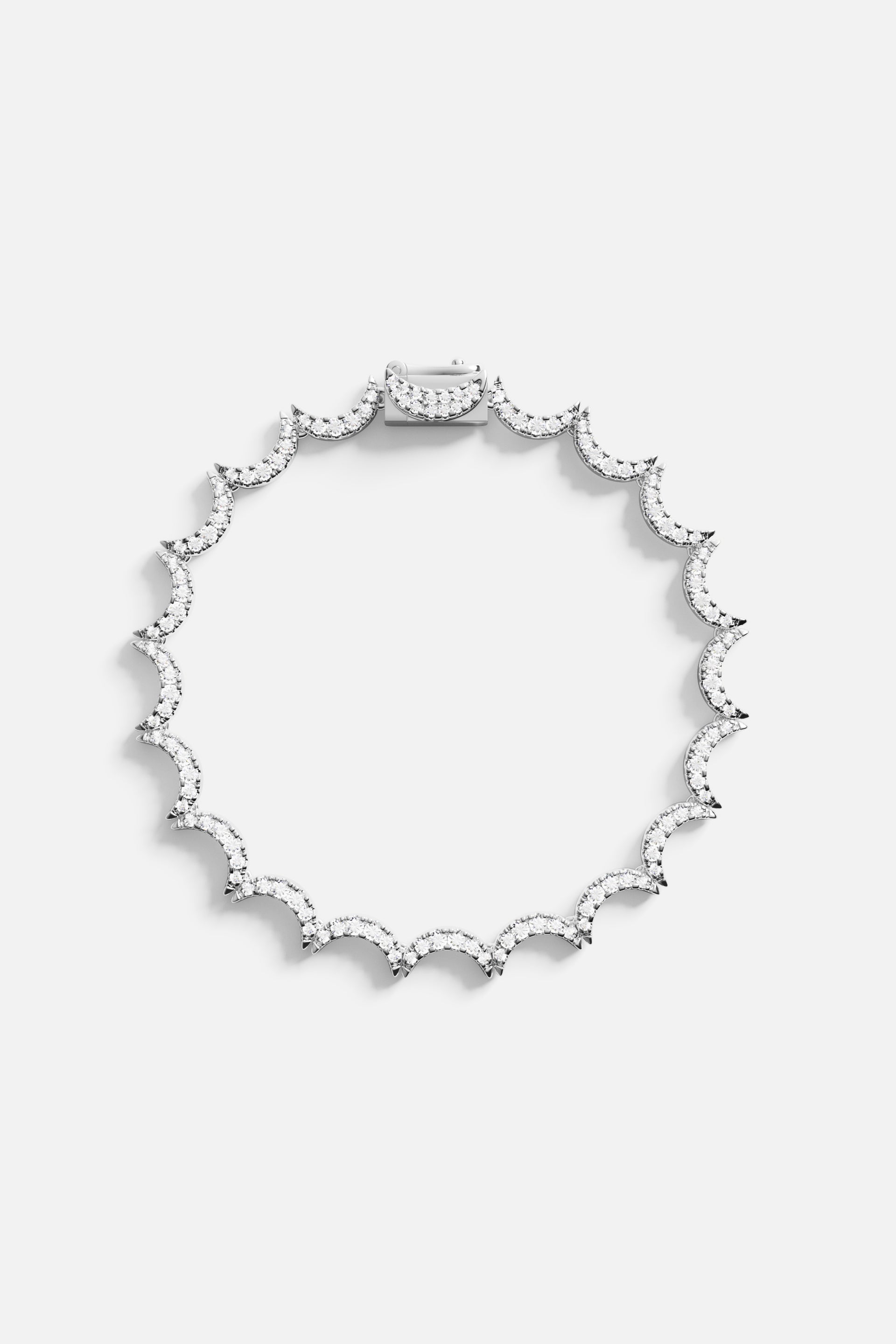 APM Bracelet with scalloped shimmer, a delicate rhythm of light around the wrist.