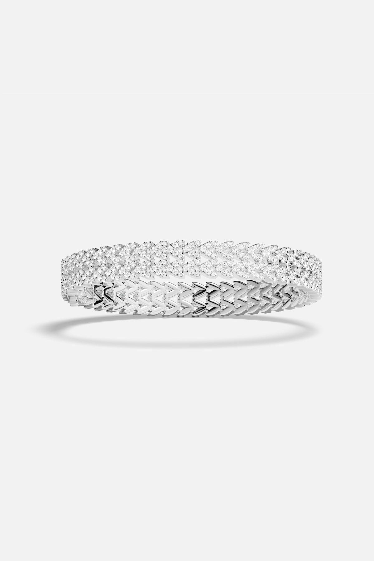 APM Bracelet in rhodium finish, a shimmering embrace of quiet radiance.