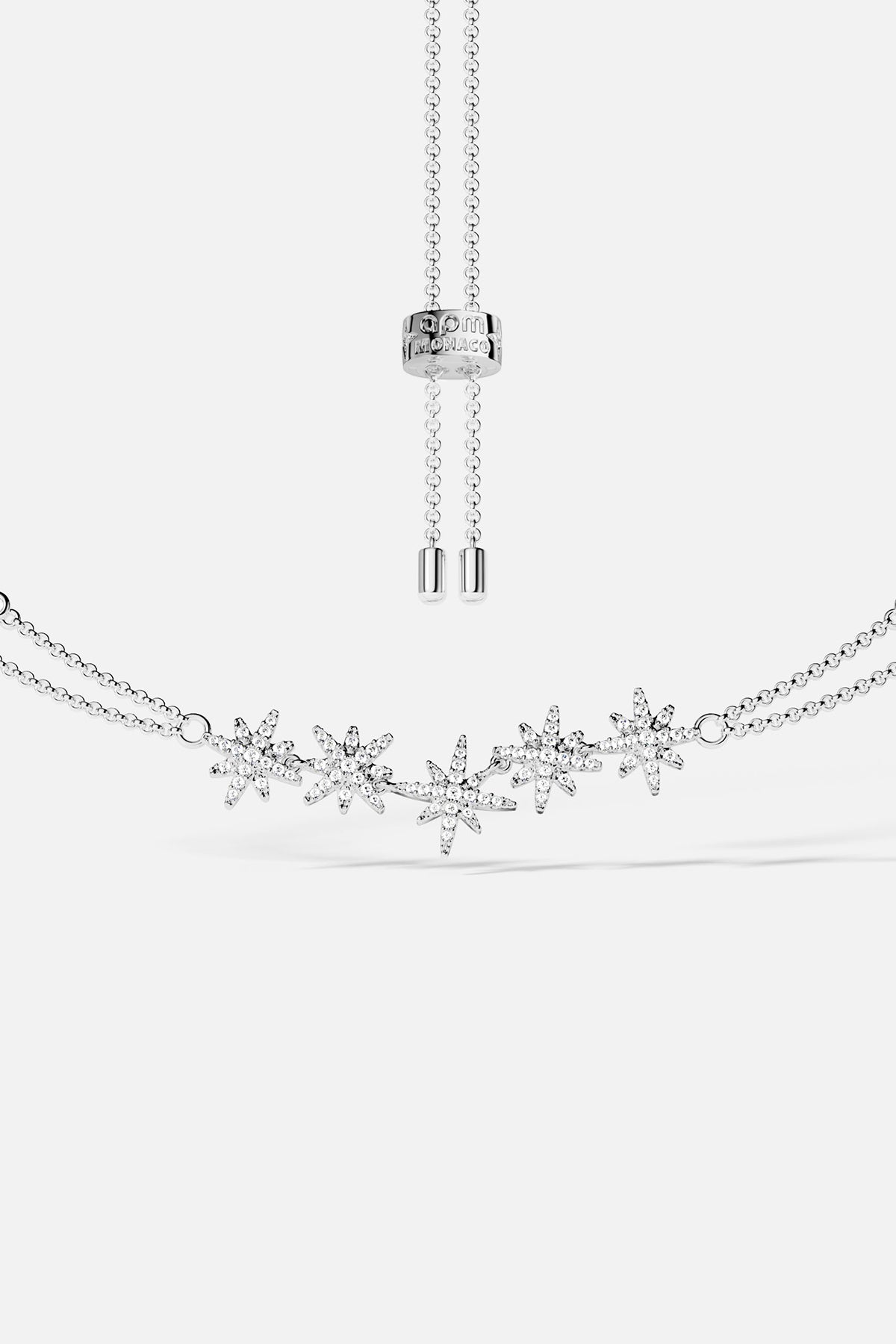 APM Météorites Bracelet, a constellation of stars shimmering in rhodium finish.