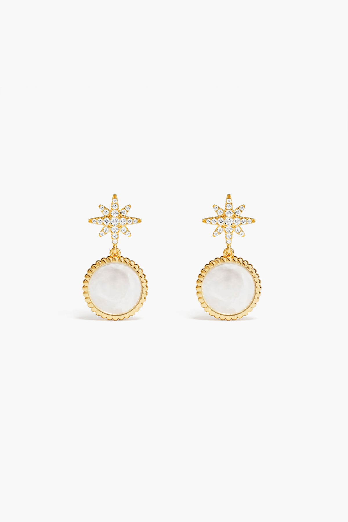 APM Étoile Earrings, a celestial glow suspended in golden light.