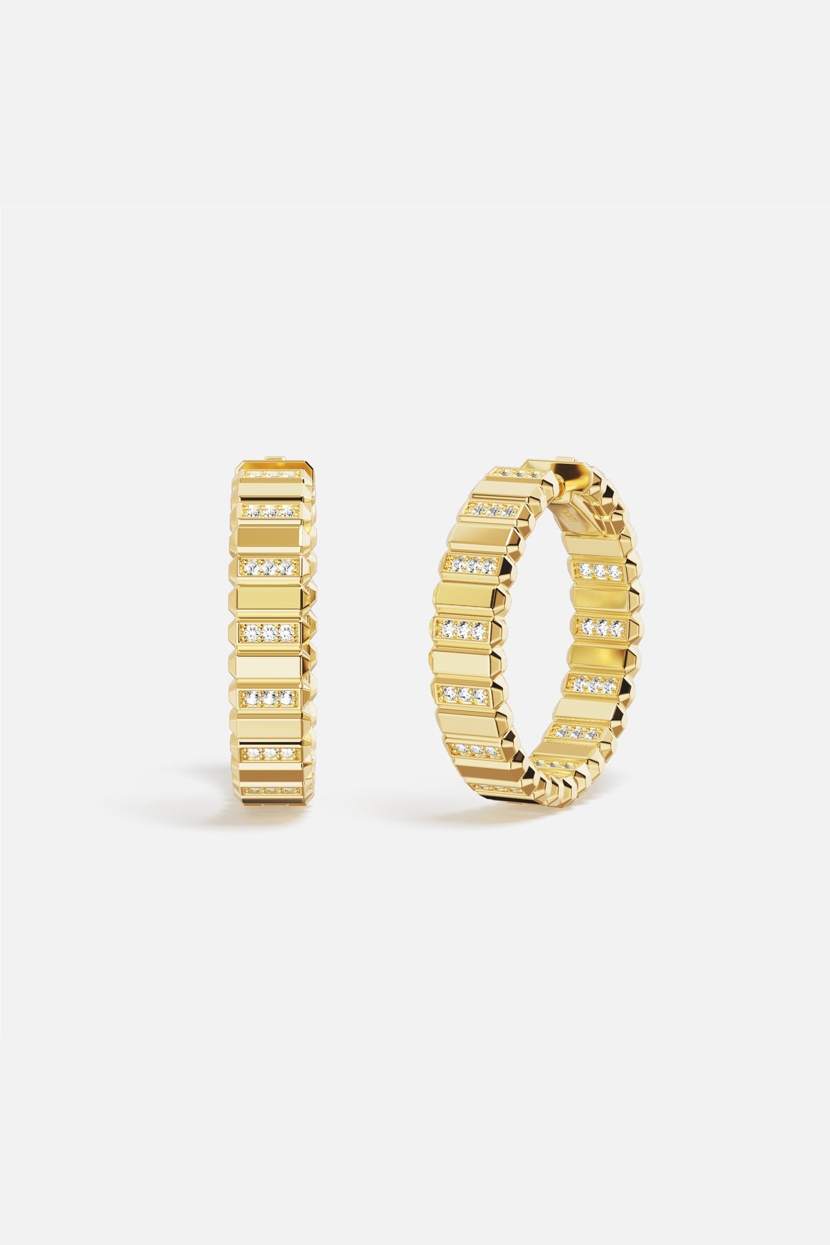 APM Hoop Earrings in golden hue, ridged brilliance for a bold, radiant statement.