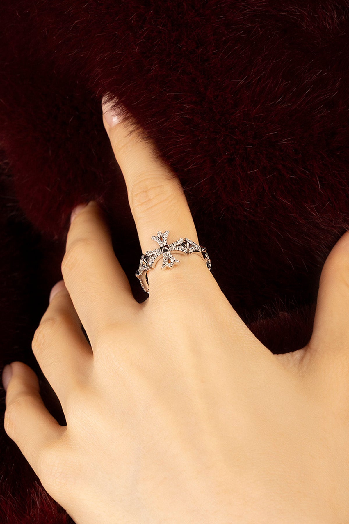 Woman wearing APM Morse Ring, a delicate sparkle whispering quiet elegance.