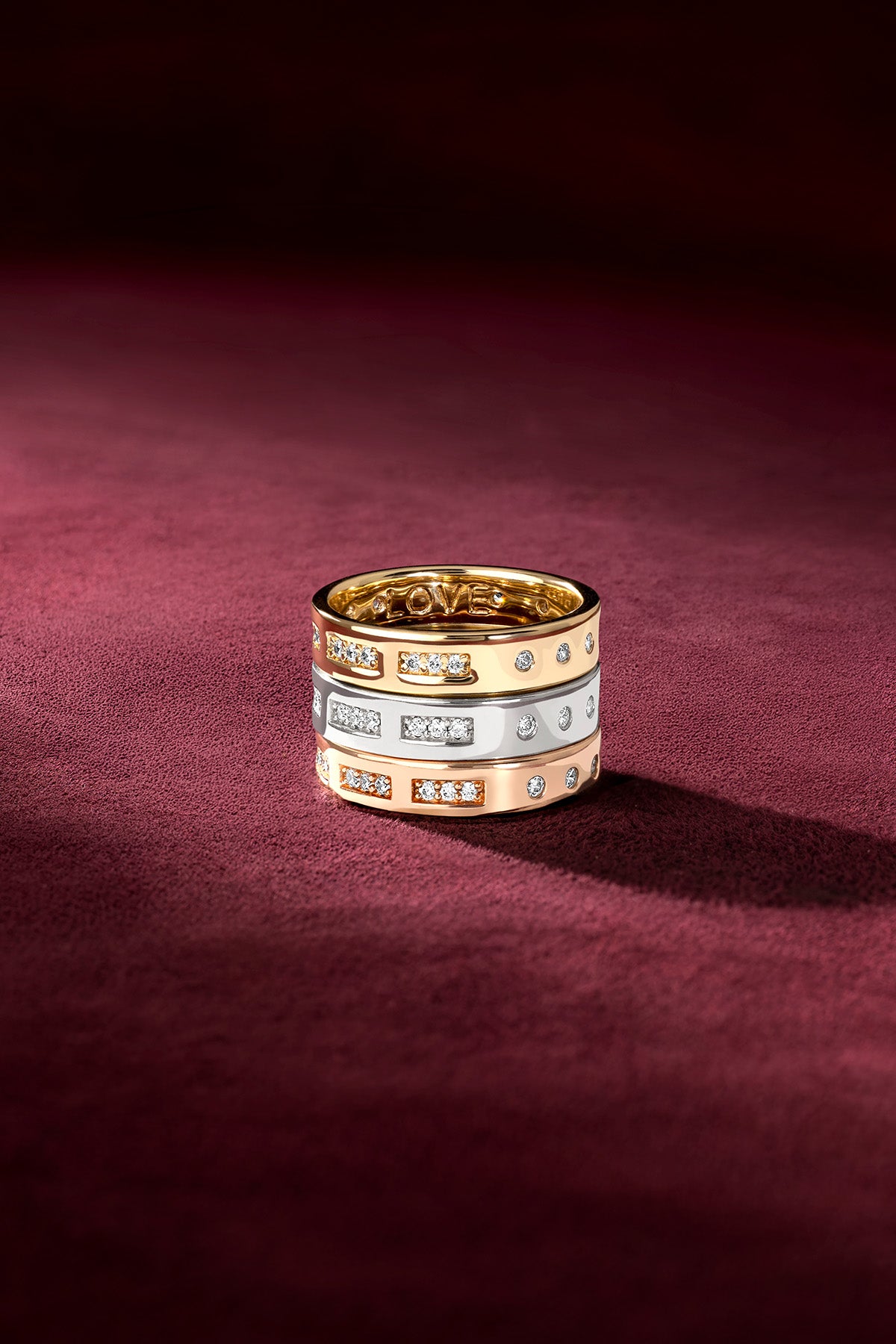 APM Rings stacked in three colors, a shimmering love story to layer.