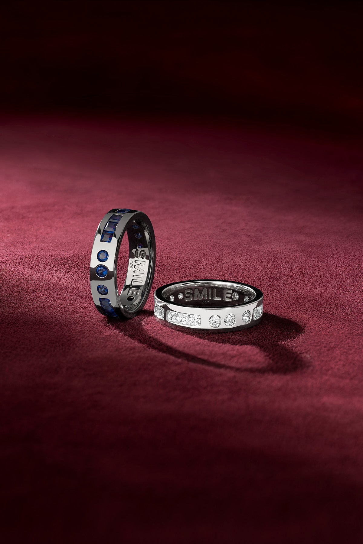 APM Smile Rings, a duet of rhodium finish glinting with quiet joy.
