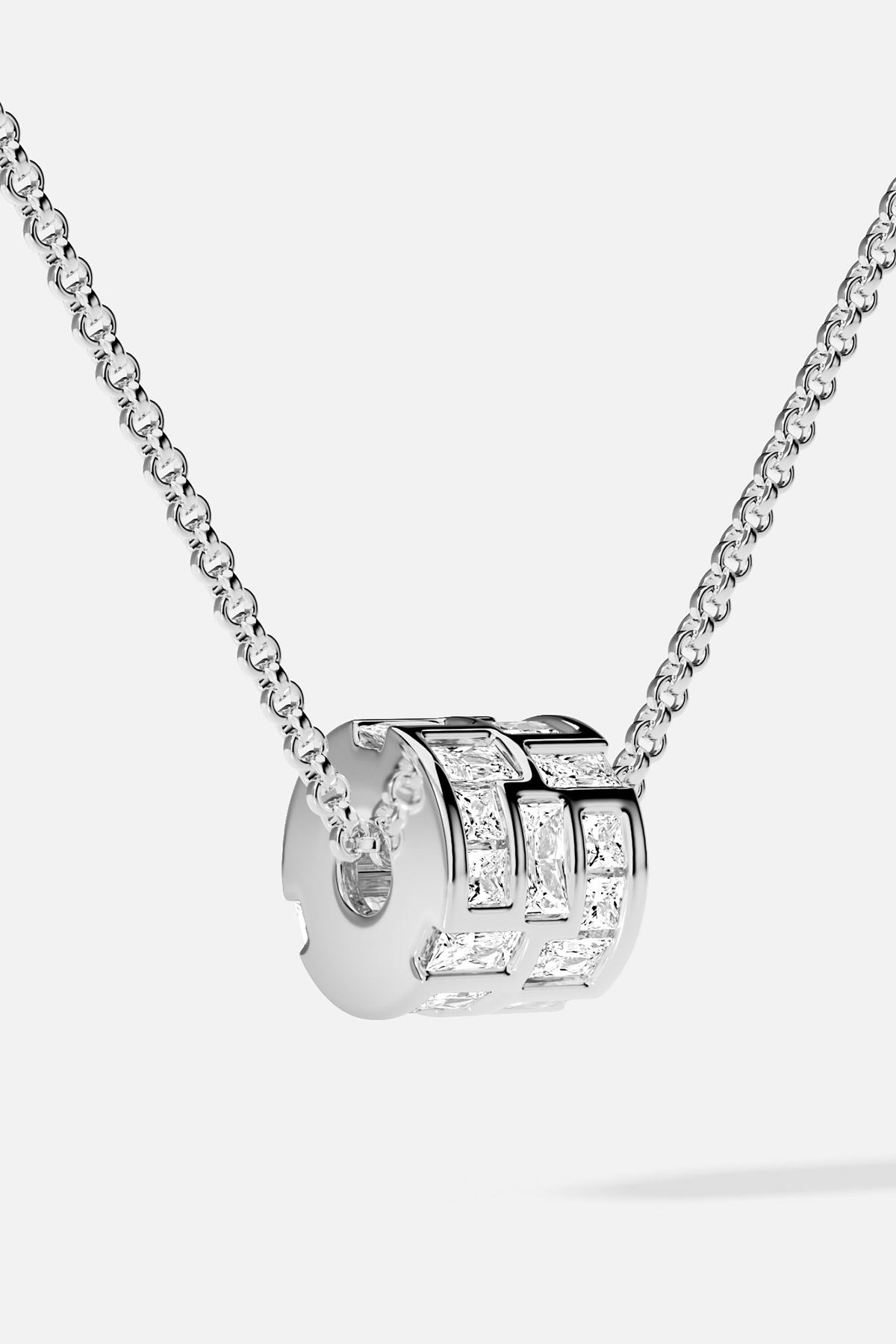 APM Monaco necklace, a luminous rhodium finish charm, effortlessly modern and radiant.
