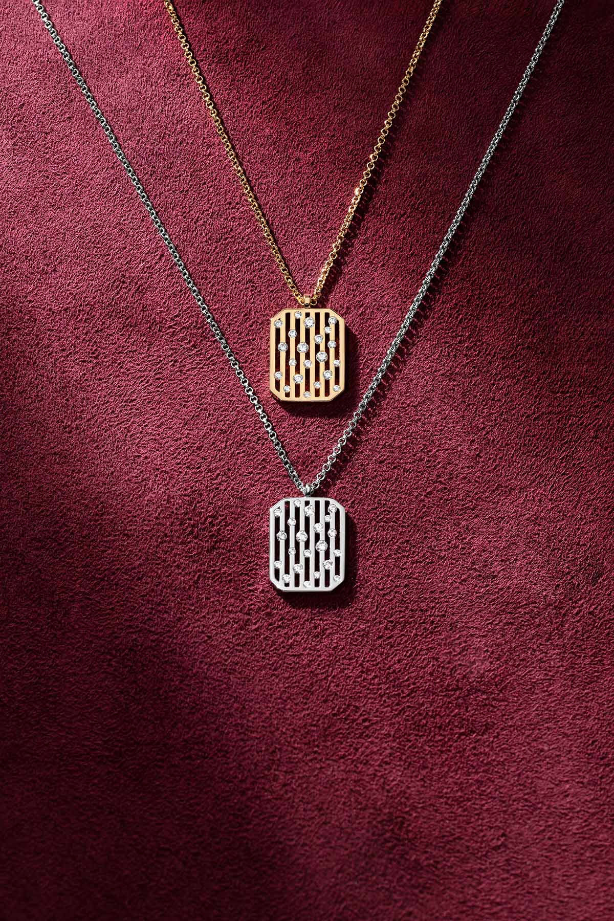 APM Morse Necklaces layered in gold and rhodium finish, a modern love letter.