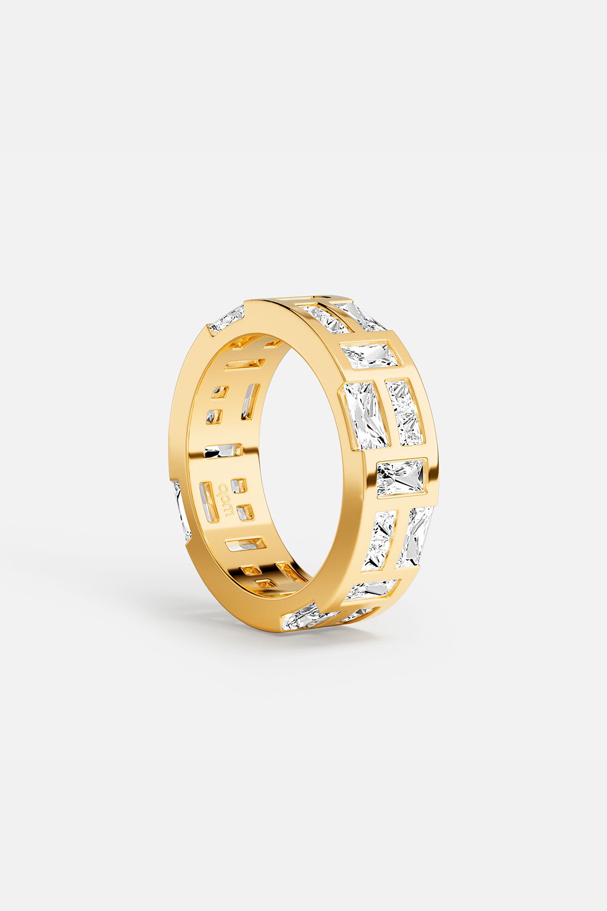 APM Ring in gold color, a bold architectural glow for modern elegance.