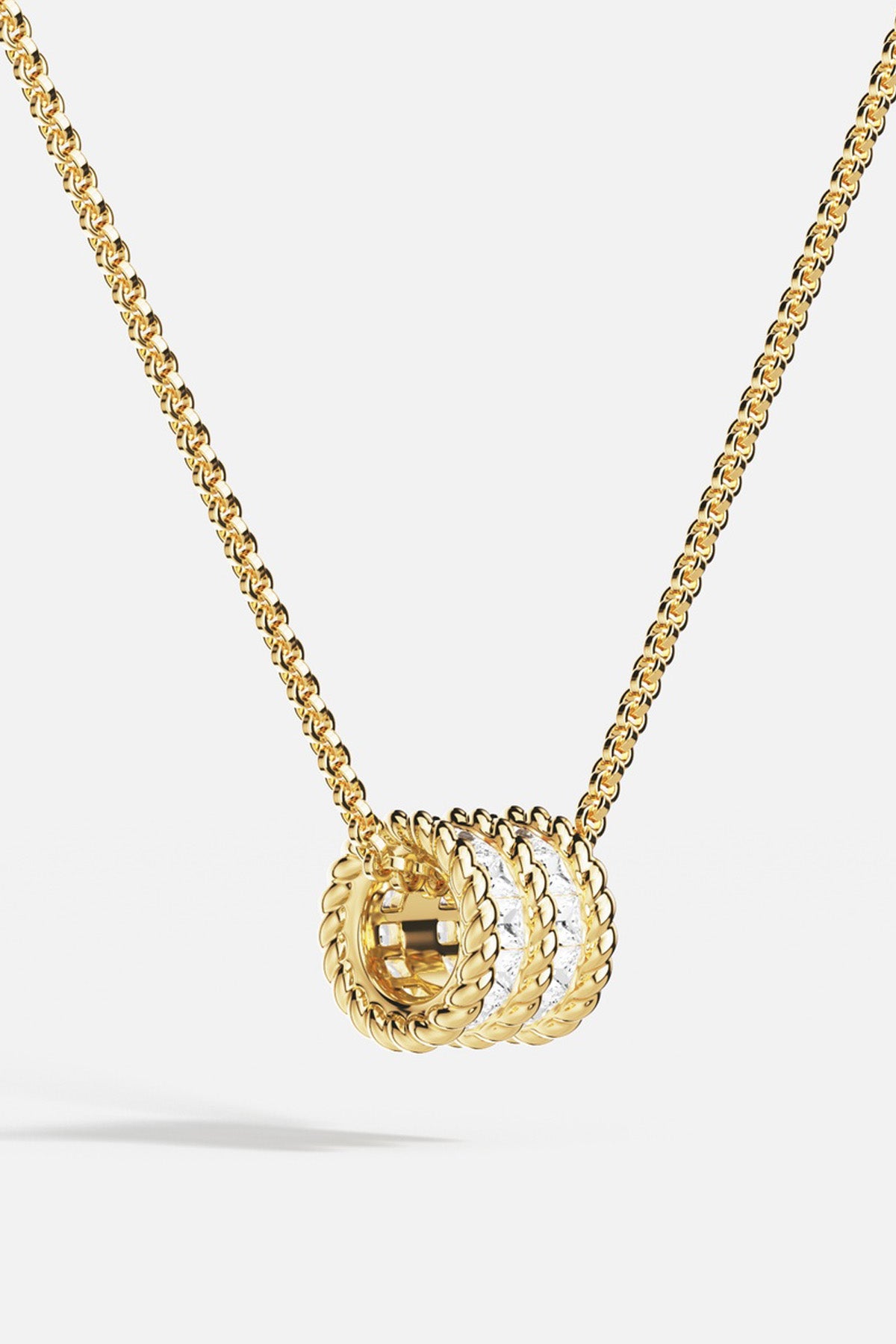 APM Necklace in golden hue, twisted charm and radiant sparkle, effortlessly chic.