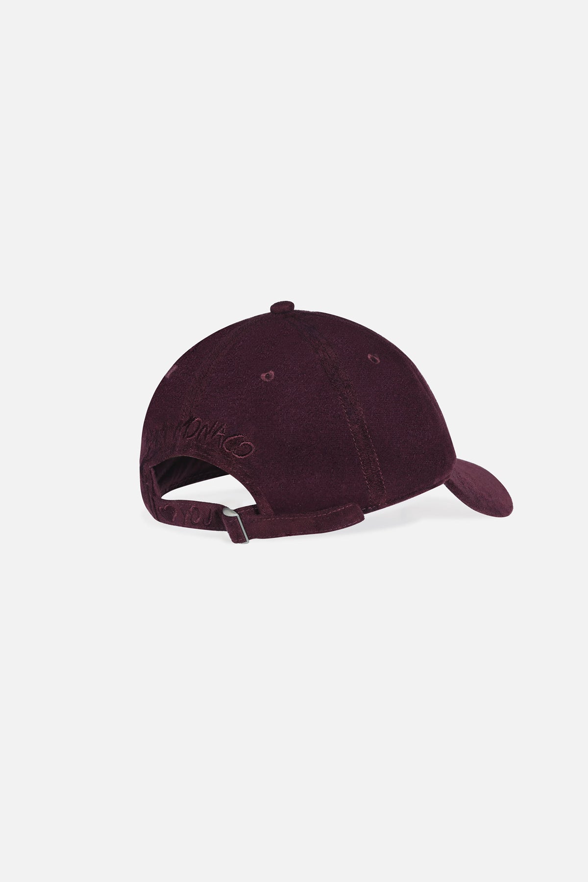 APM Cap in deep burgundy, an effortless signature for city-cool moments.