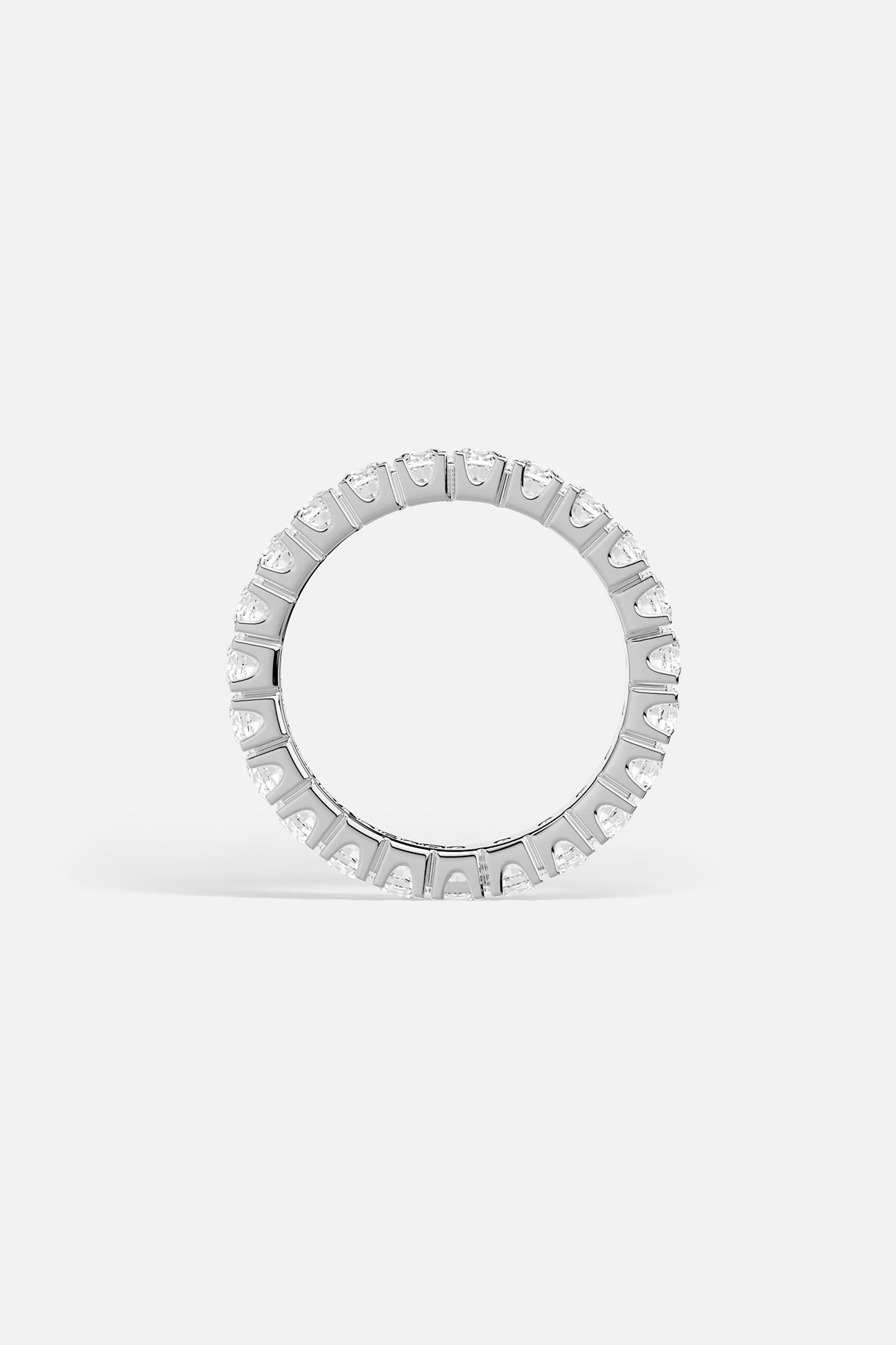 APM Ring in rhodium finish, a luminous circle of quiet elegance.